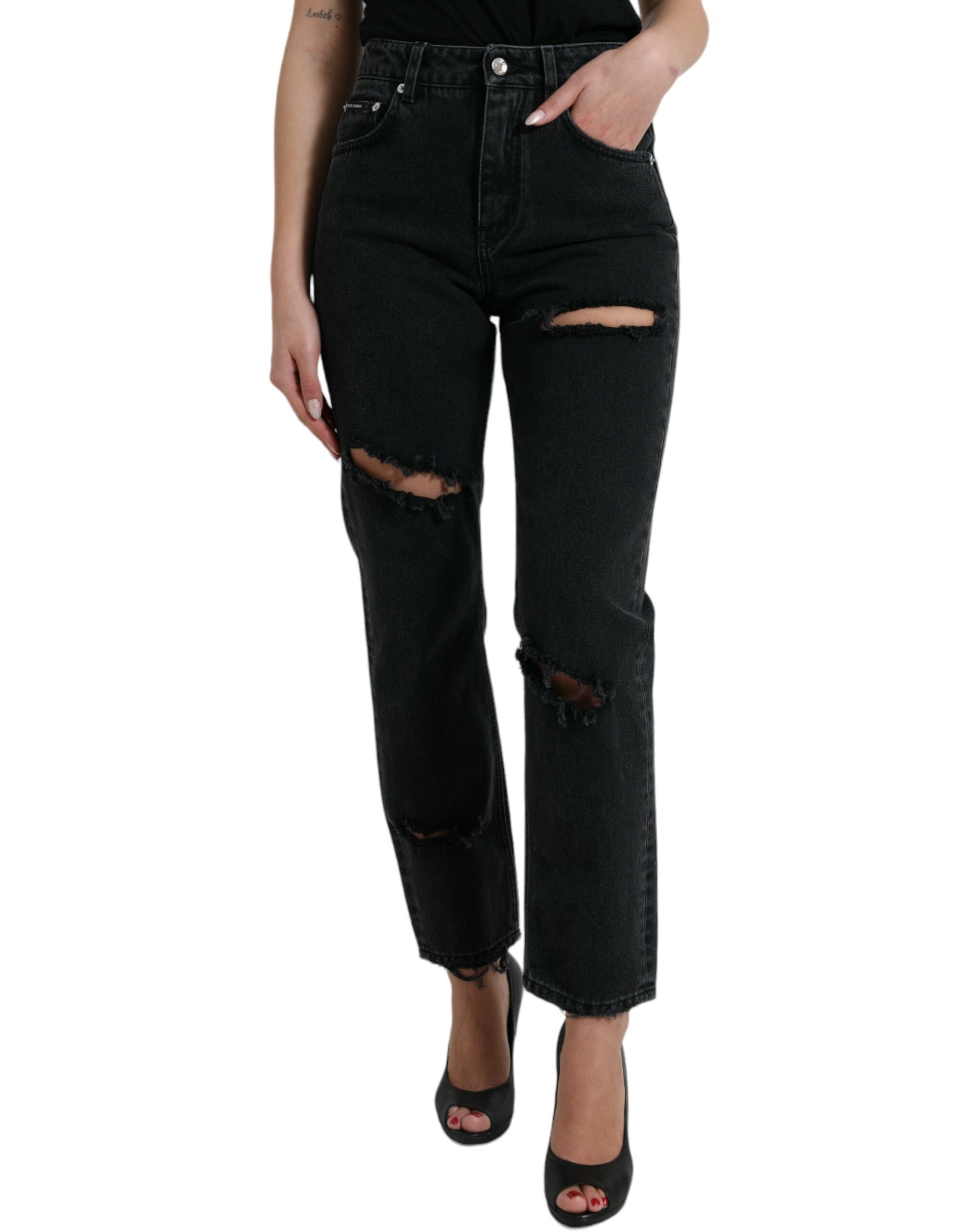 Jeans en denim noir à taille haute de Dolce & Gabbana, déchirés et tendance, en coton épais.