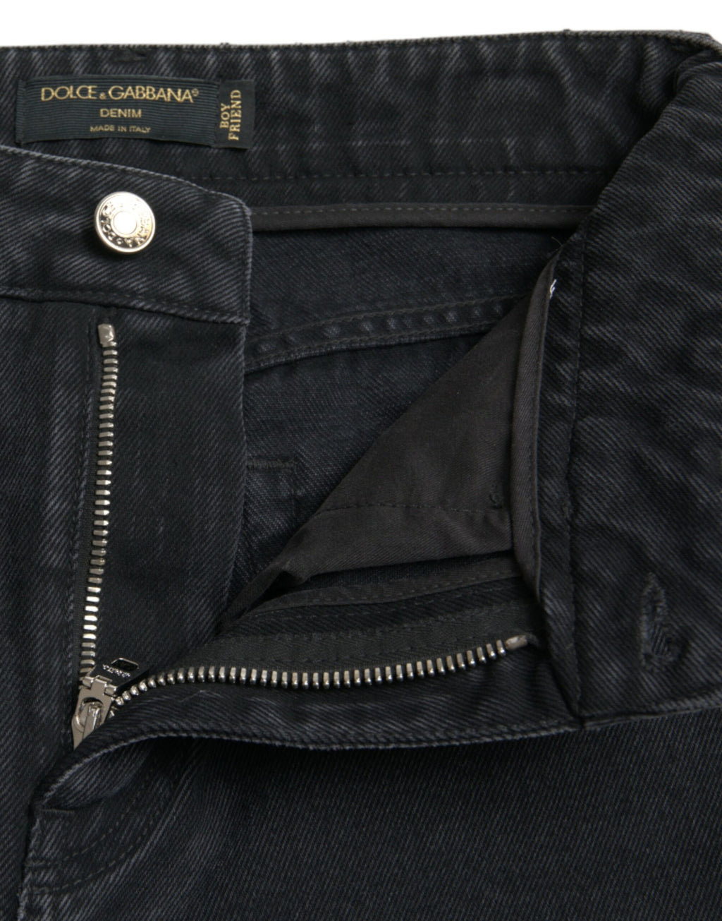 Jeans en denim noir Dolce & Gabbana à taille haute, déchirés et tendance, en coton durable.