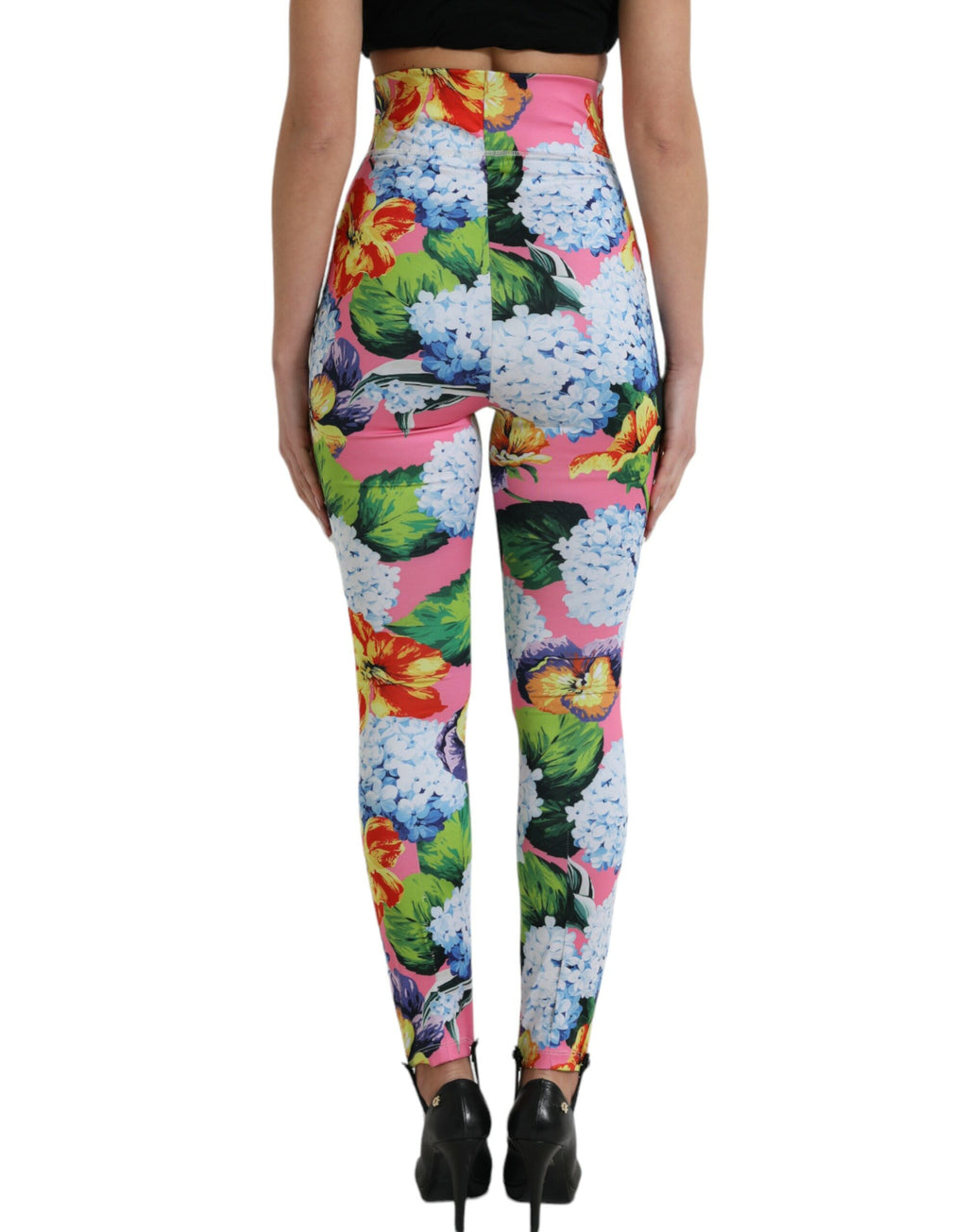 Leggings Dolce & Gabbana à fleurs multicolores, taille haute, mode élégante et confortable, visibles en gros plan.