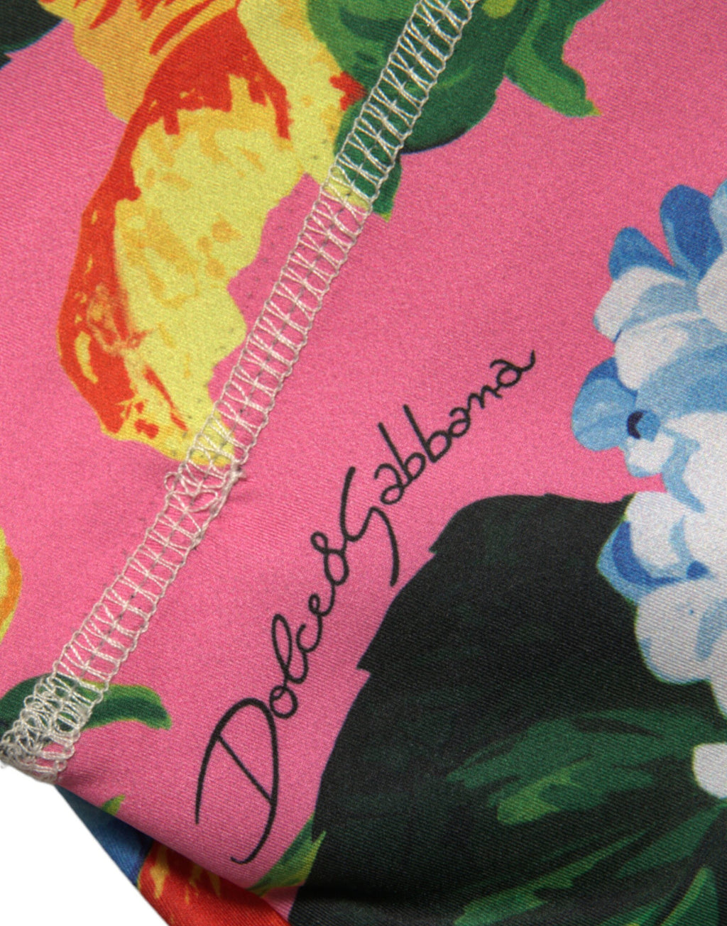 Leggings Dolce & Gabbana à fleurs multicolores à taille haute, tissu stretch, motif floral élégant.