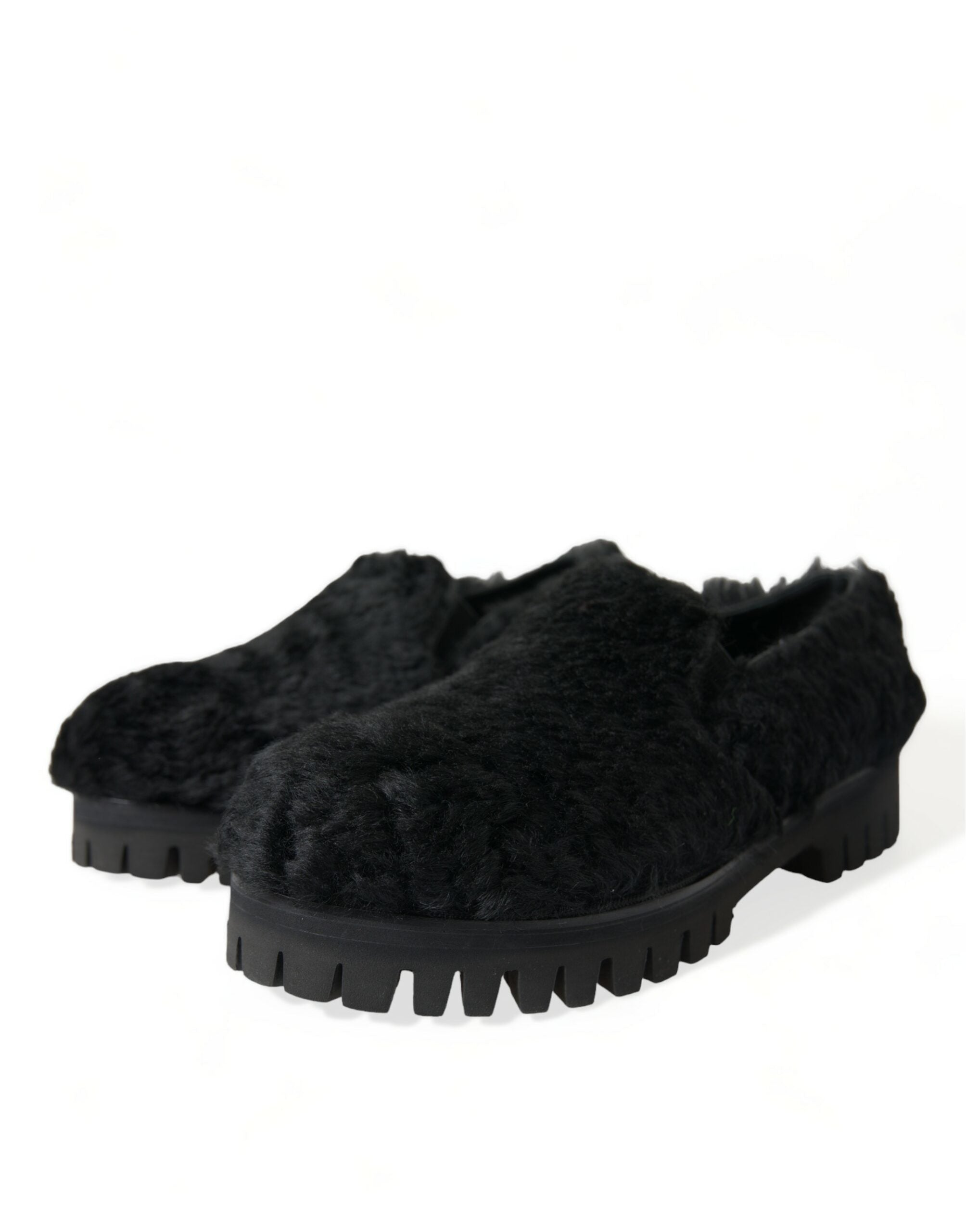 Chaussures élégantes Dolce & Gabbana en cuir et fourrure noires, slippers ou chaussures de ville raffinées pour femme.