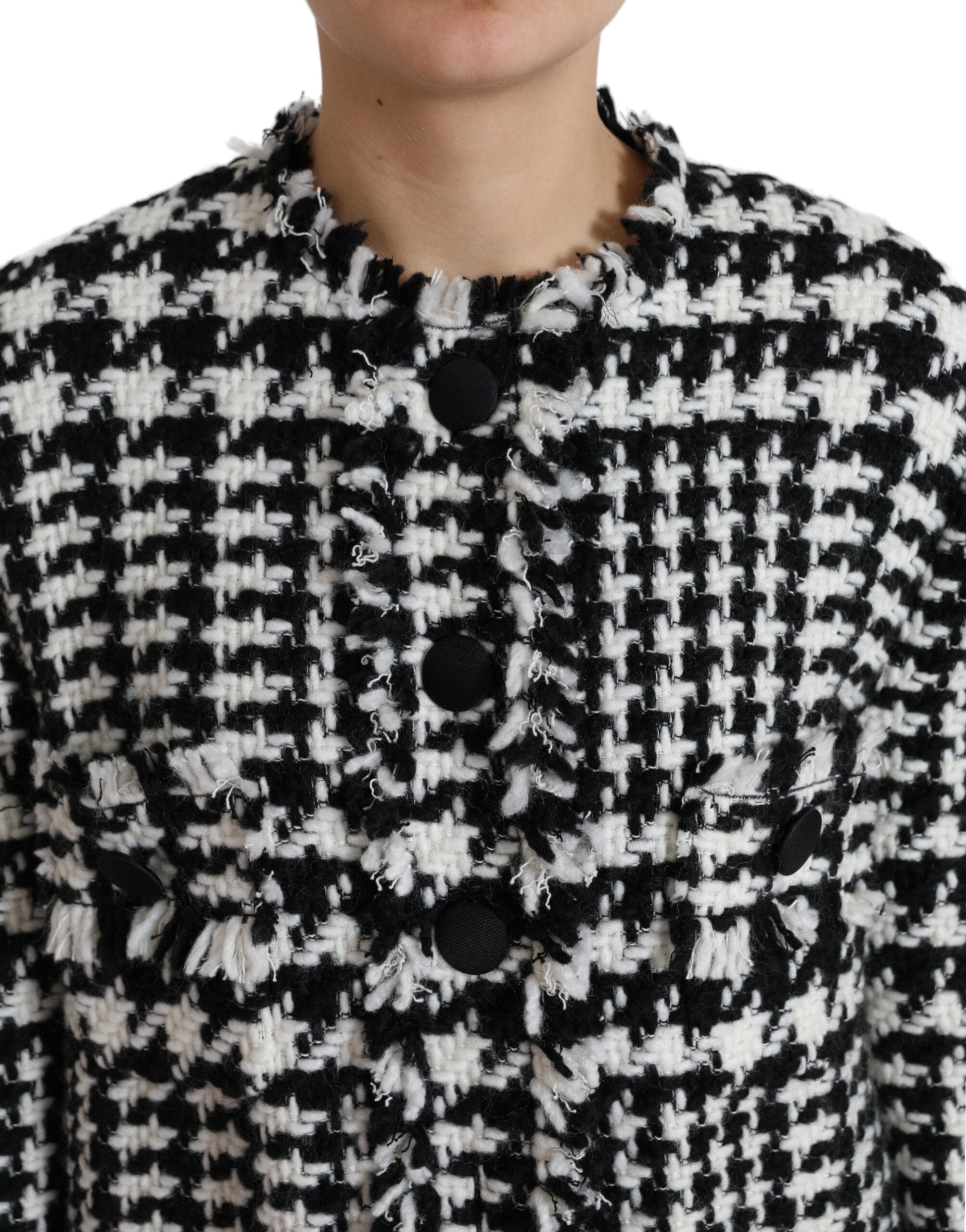 Manteau trench noir et blanc à motif pied-de-poule Dolce & Gabbana avec ceinture et col classique, vue de face.