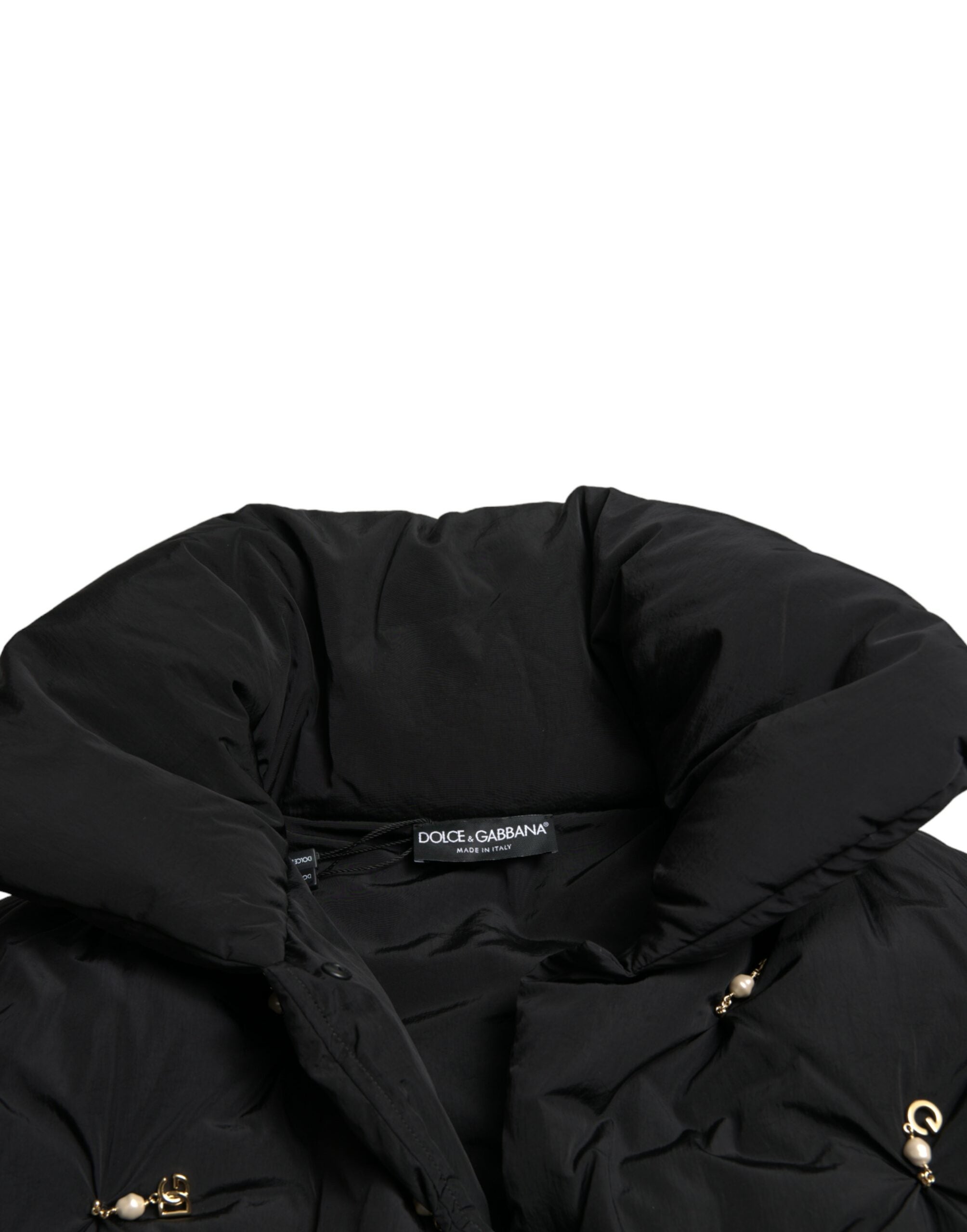 Veste bomber matelassée noire Dolce & Gabbana avec embellissements, design élégant et moderne, vue de face sur la veste.