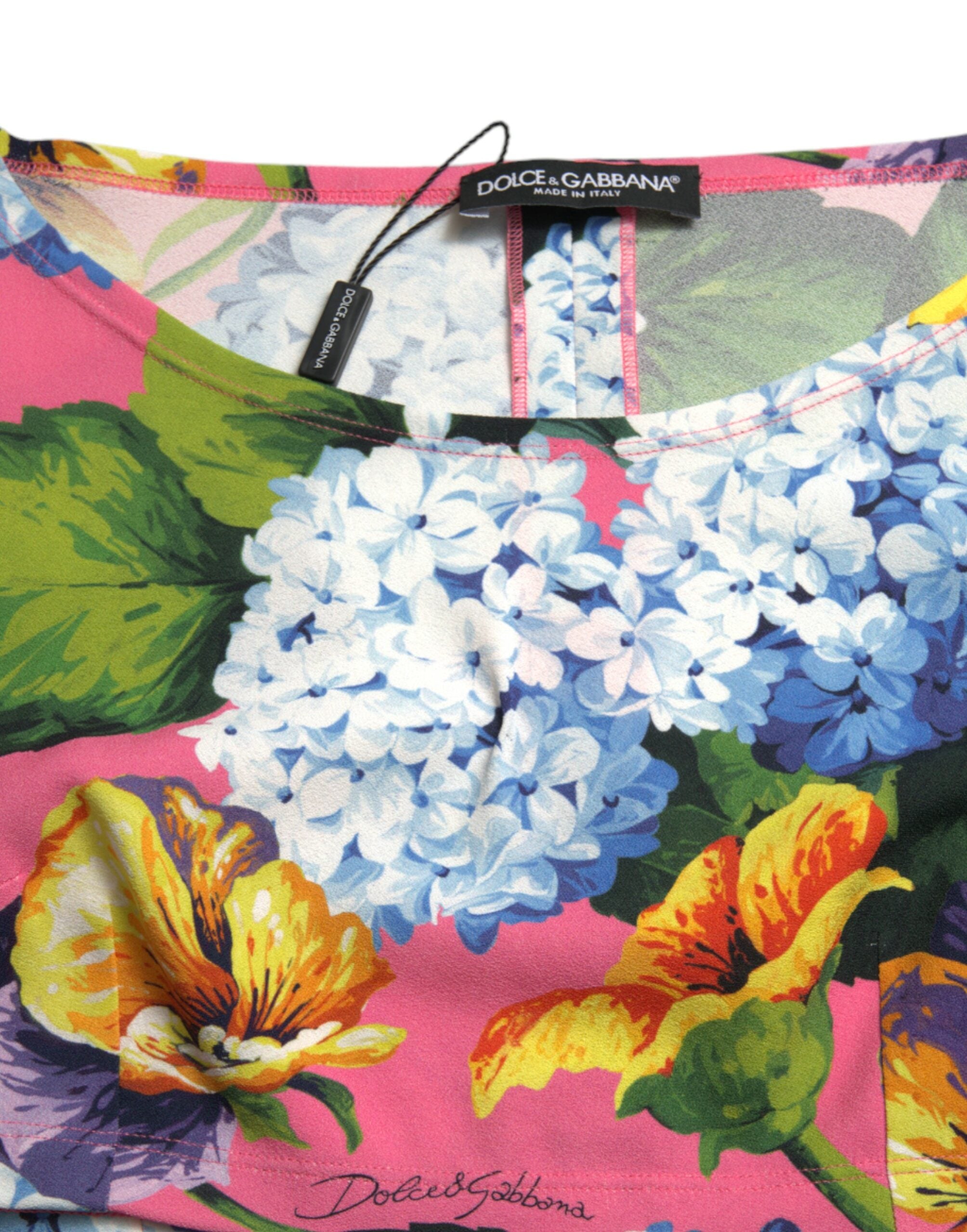 Haut court à manches longues Dolce & Gabbana à fleurs multicolores, style floral, coupe crop, tissu léger.