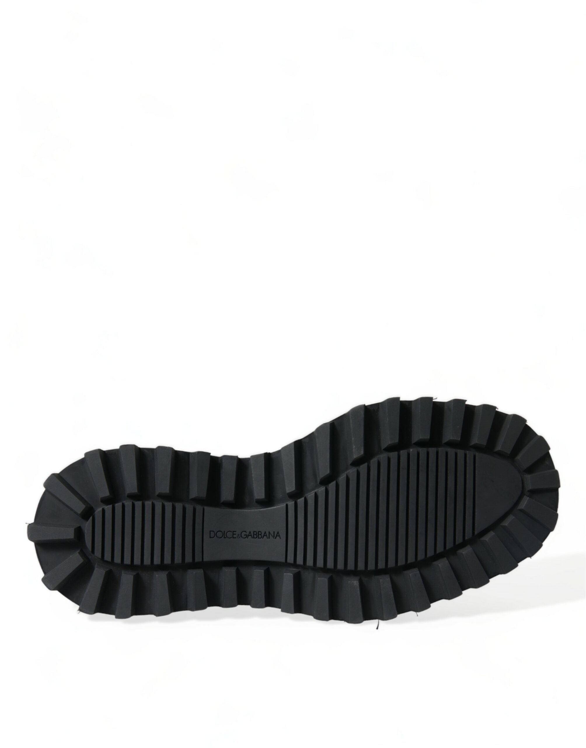 Bottes Chelsea noires en cuir stretch de Dolce & Gabbana, style slip-on, avec finition élégante et semelle en caoutchouc.