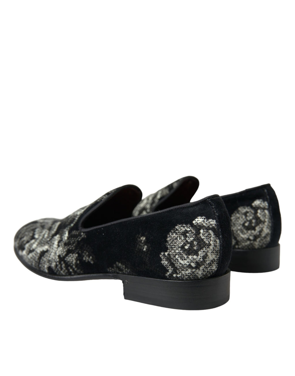Pantoufles hommes Dolce & Gabbana noires avec motif floral, chaussures de ville élégantes et confortables.