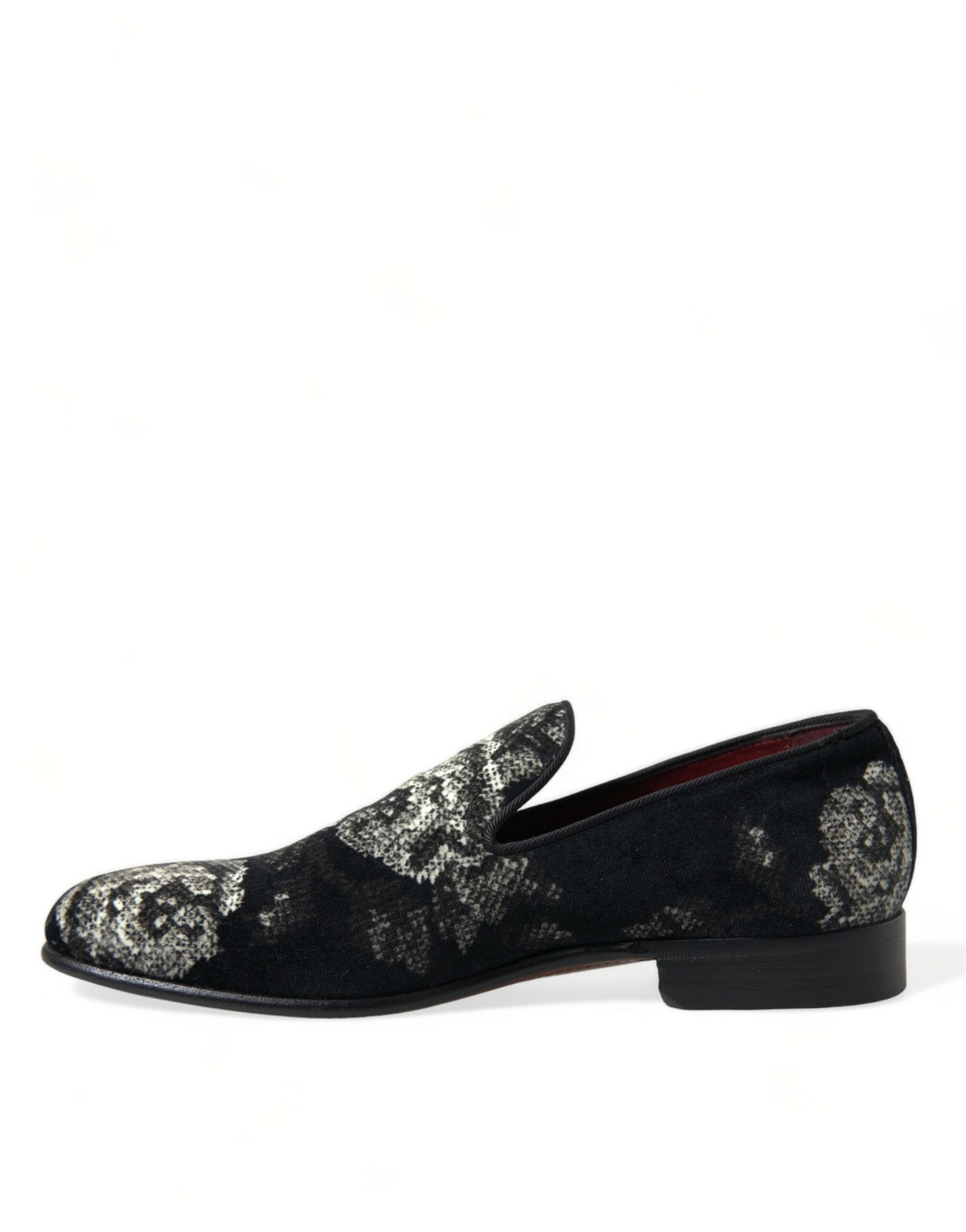 Mules homme Dolce & Gabbana noires avec motif floral, chaussures habillées en cuir, vue de côté.