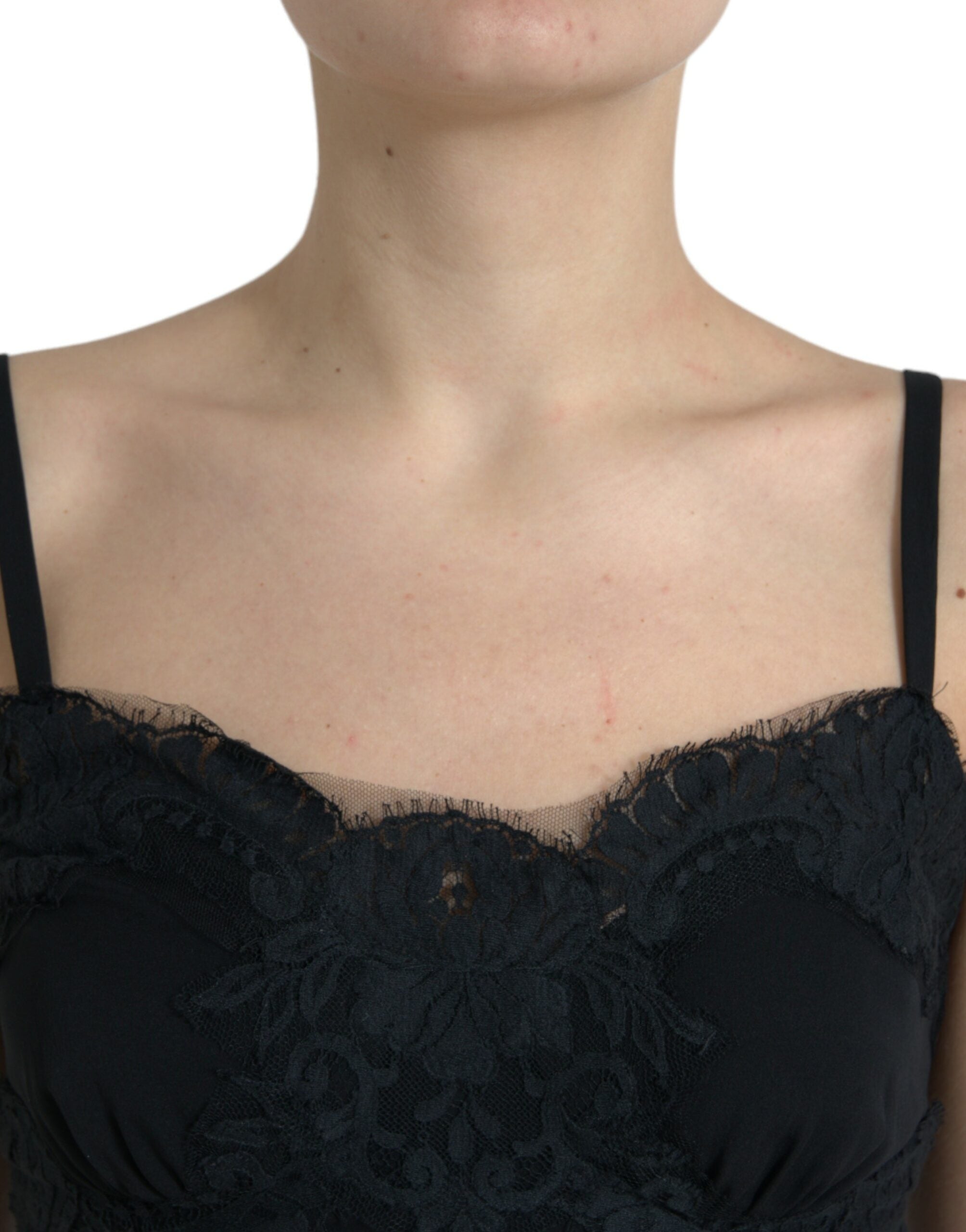 Débardeur sans manches en soie noire avec dentelle extensible, de la marque Dolce & Gabbana, visible en gros plan.