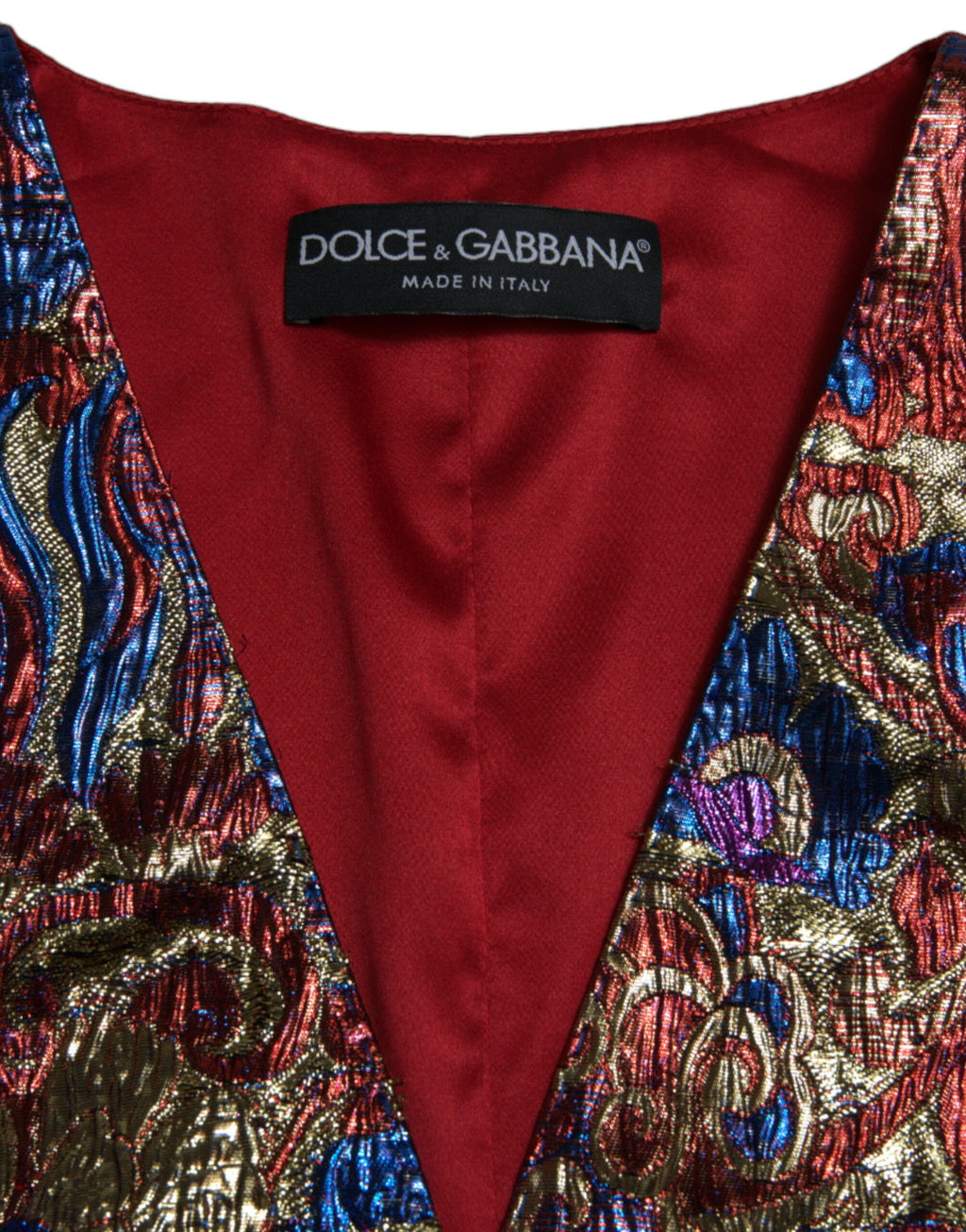 Gilet sans manches Dolce & Gabbana en jacquard multicolore avec boutons, style élégant et sophistiqué.