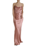 Robe longue en soie rose Dolce & Gabbana avec bretelles spaghetti, élégante et fluide, portée sur un mannequin.