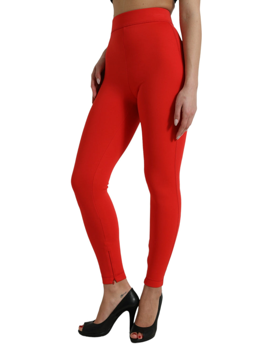 Pantalons slim en nylon stretch rouge de Dolce & Gabbana, pantalon élégant et ajusté pour femme, vue de face.