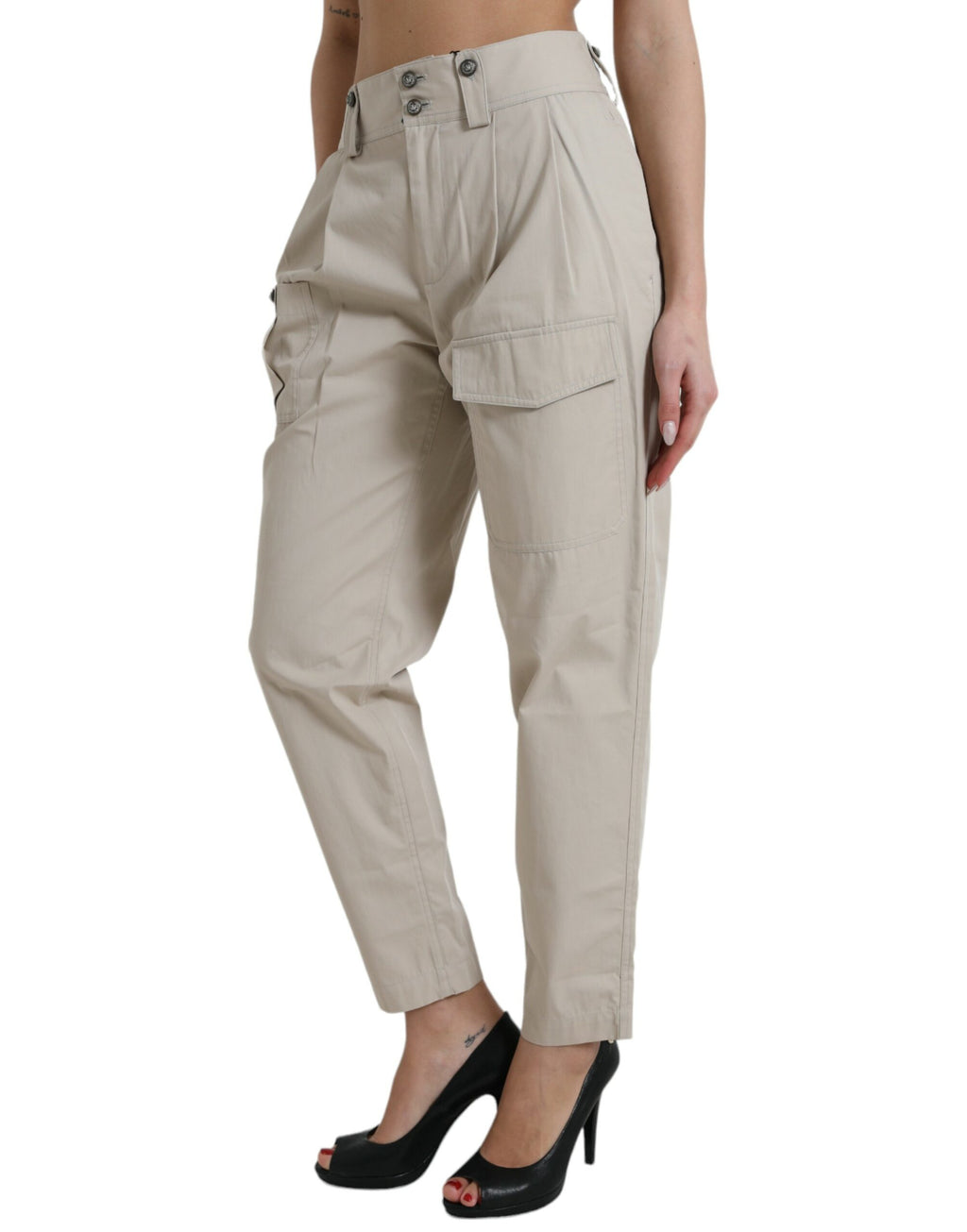 Pantalons beige en coton à taille haute et coupe tapered de Dolce & Gabbana, visible avec détails de couture élégants.