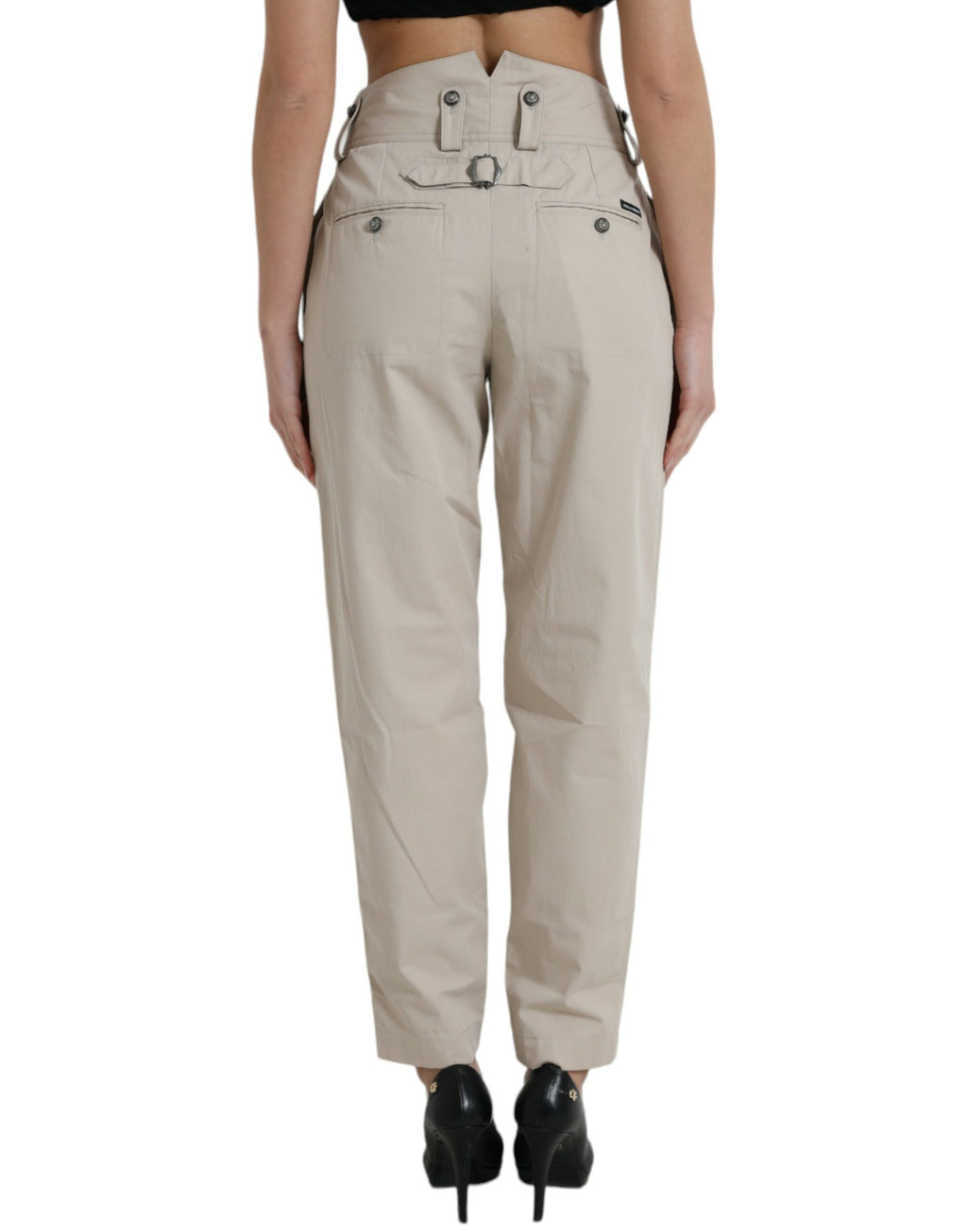 Pantalons beige en coton à taille haute et coupe tapered de Dolce & Gabbana, vue de face.