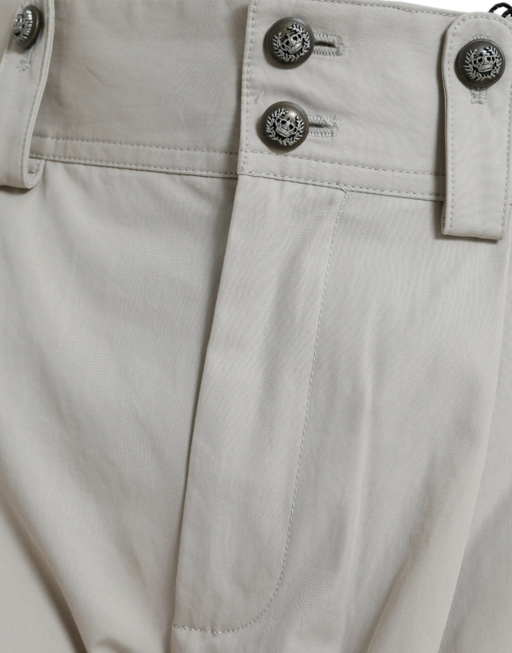 Pantalons beige en coton à taille haute et coupe tapered de Dolce & Gabbana, vêtement élégant pour femme.
