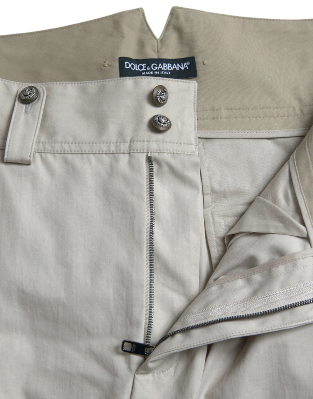 Pantalons beige en coton à taille haute et coupe tapered de Dolce & Gabbana, style élégant et moderne.