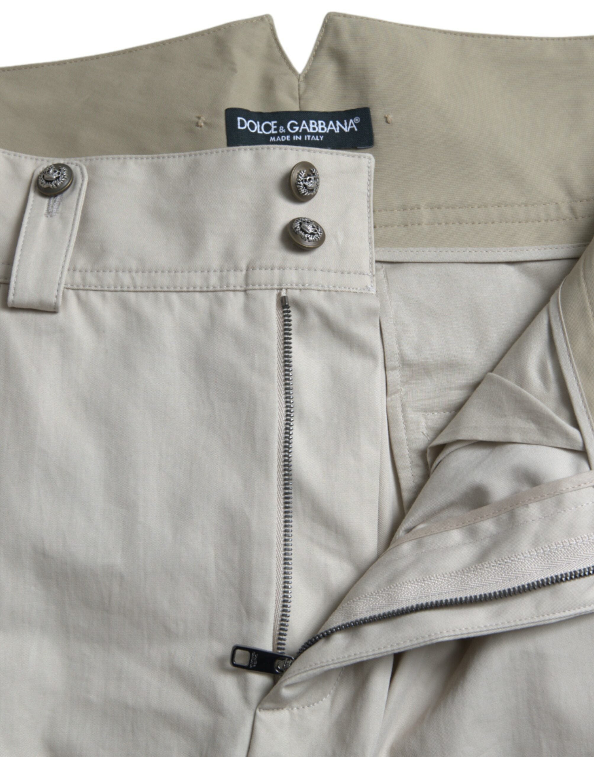 Pantalons beige en coton à taille haute et coupe tapered de Dolce & Gabbana, style élégant et moderne.