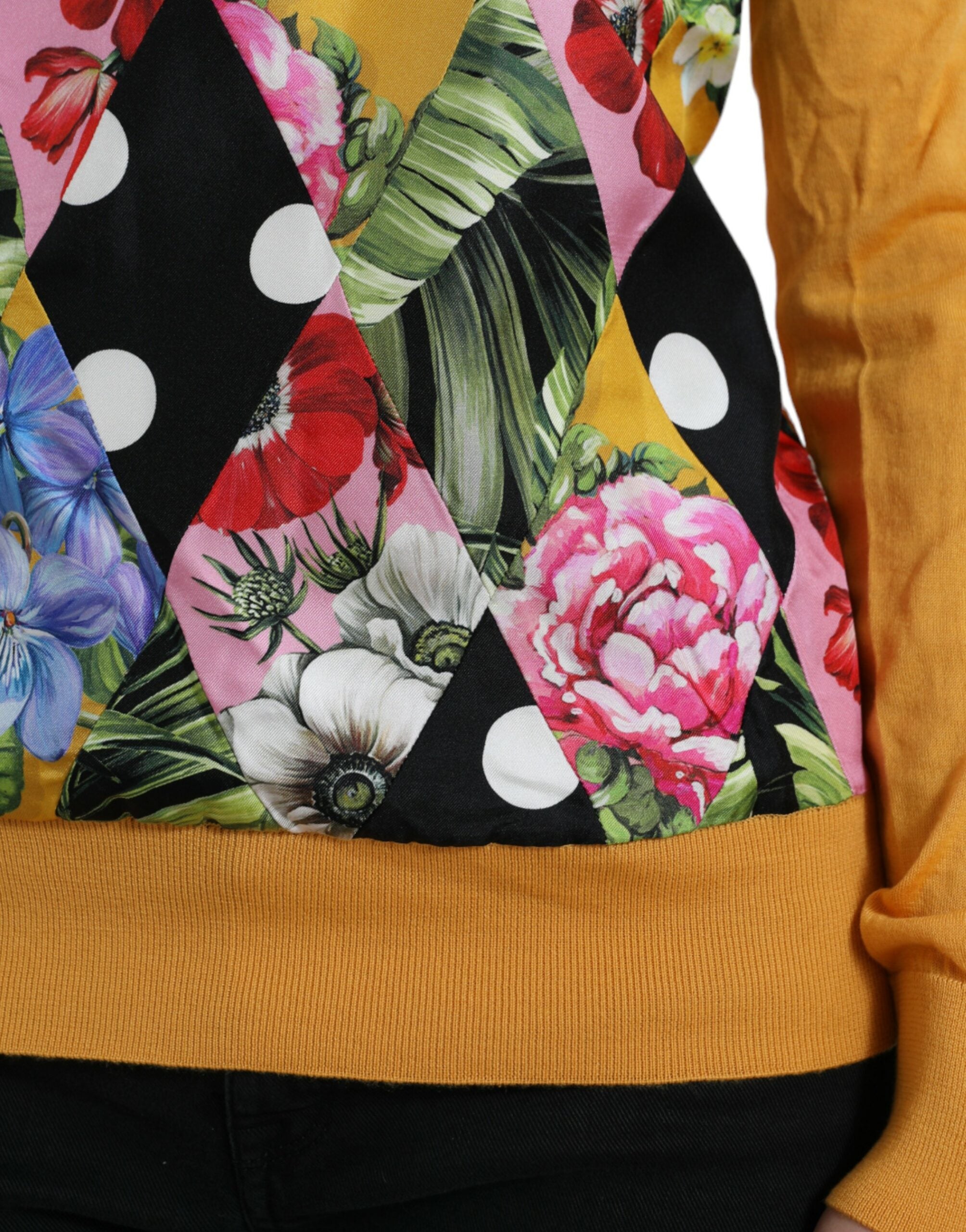 Pull homme Dolce & Gabbana en cachemire multicolore avec patchwork, col Henley, détails colorés et style élégant.