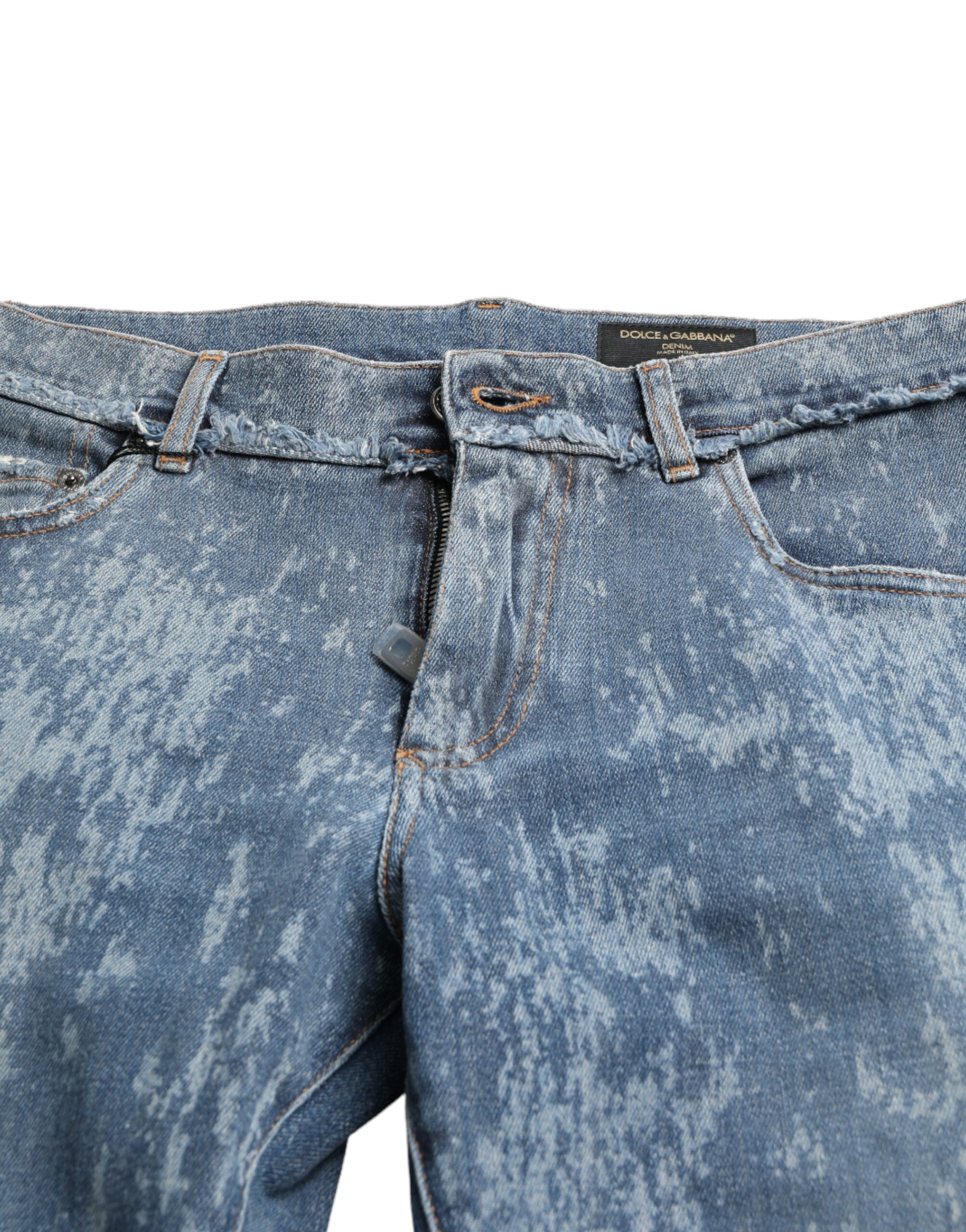 Jeans skinny en denim coton stretch bleu délavé de Dolce & Gabbana, vue de face avec détails de couture.
