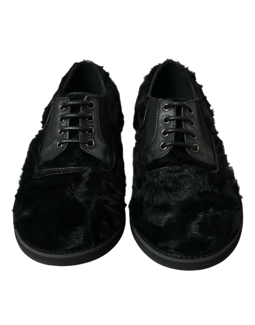 Chaussures derby pour femme en cuir noir et fourrure, à lacets, de la marque Dolce & Gabbana, vues de face.