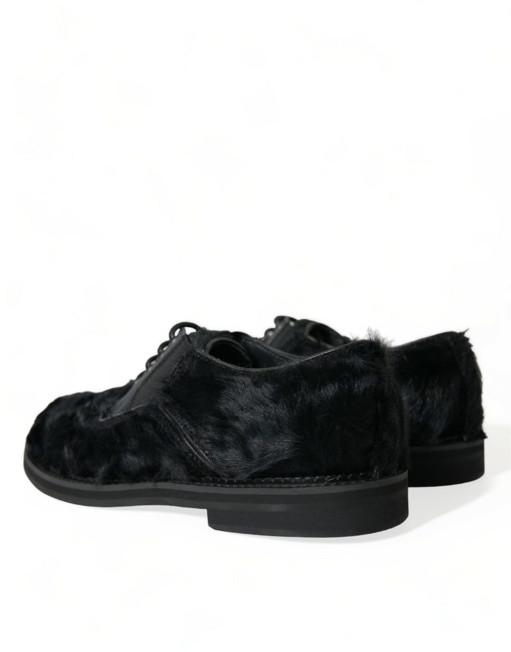 Chaussures Derby en cuir et fourrure noire de Dolce & Gabbana avec lacets, élégantes et sophistiquées.