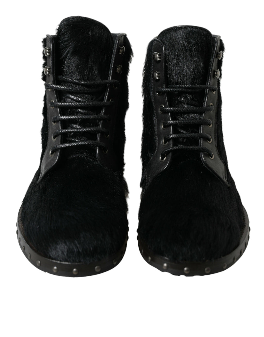 Bottes en cuir noir de style pony pour mi-mollet de la marque Dolce & Gabbana, élégantes et sophistiquées.