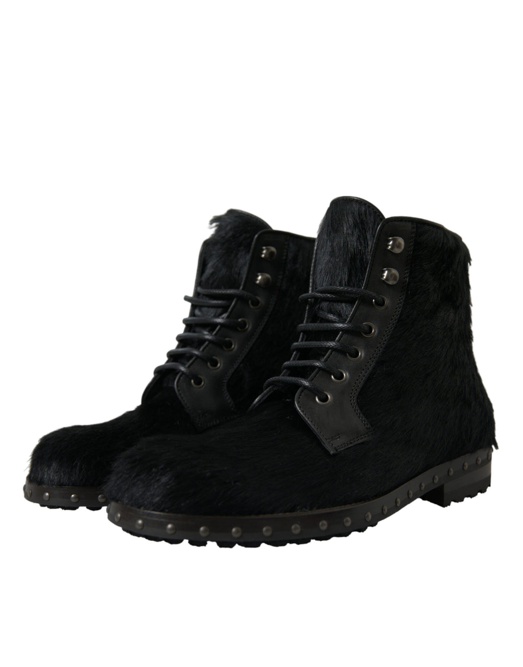 Bottes en cuir noir style pony de mi-mollet de la marque Dolce & Gabbana, avec design élégant et talons moyens.
