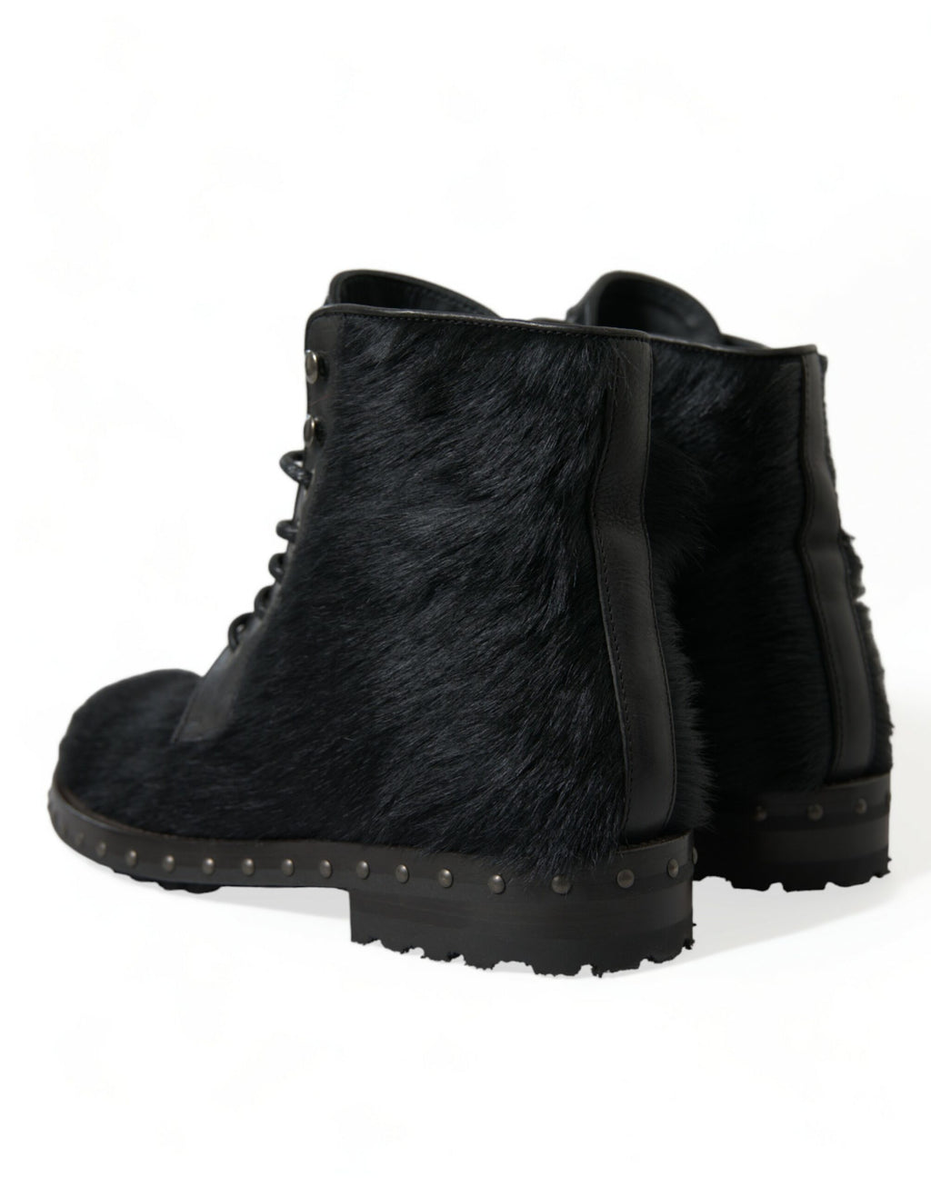 Bottes mi-mollet en cuir noir style pony de Dolce & Gabbana, chaussures élégantes avec finition raffinée.