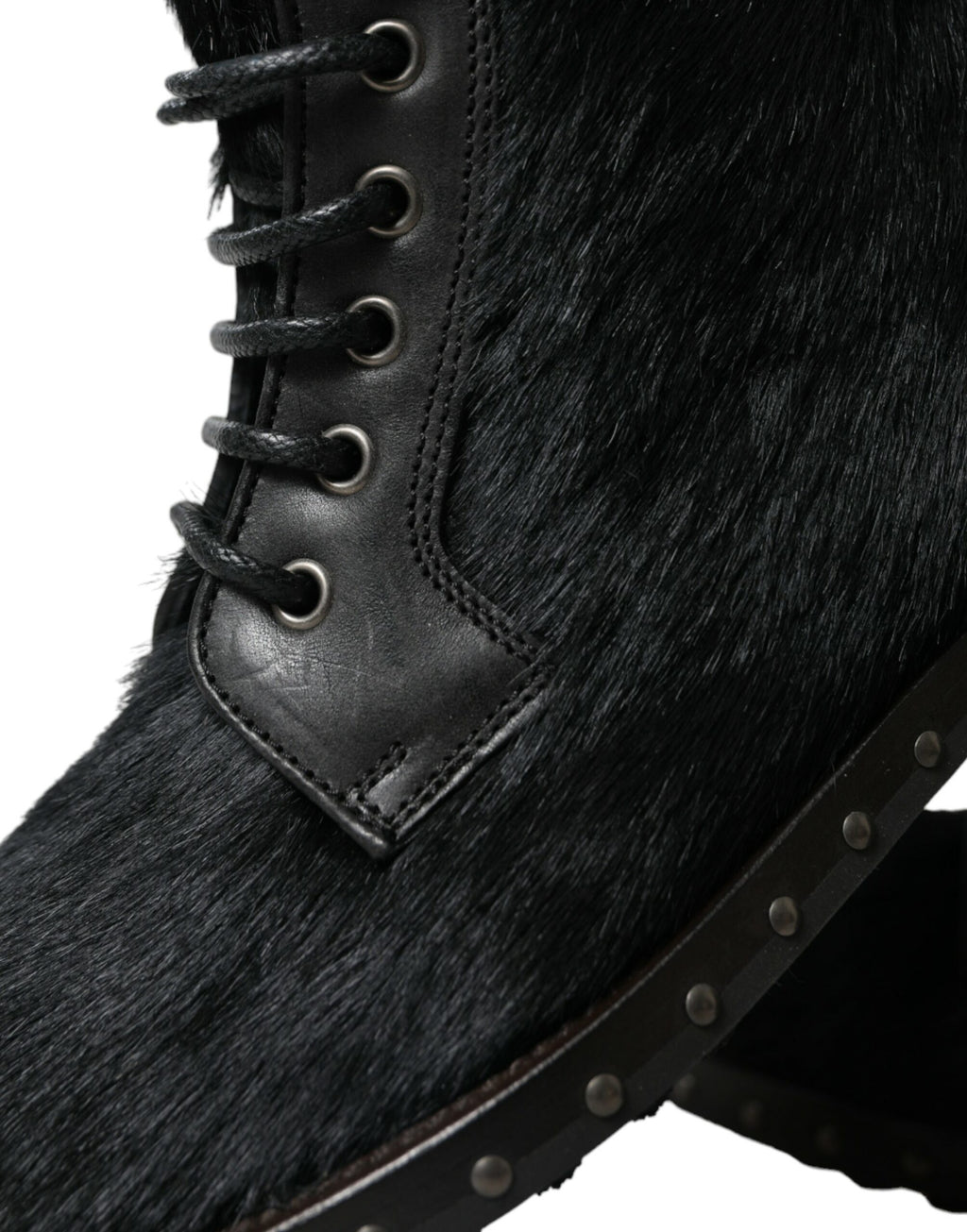 Bottes en cuir noir style pony de mi-mollet de Dolce & Gabbana, chaussures élégantes avec finition soignée et semelle robuste.