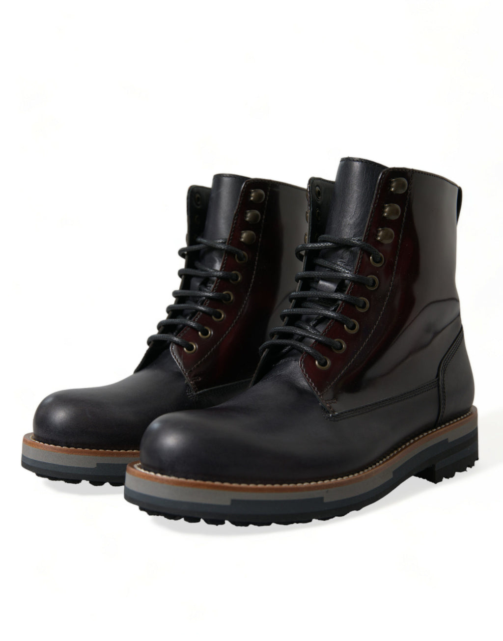 Chaussures bottines militaires en cuir noir Dolce & Gabbana, style combat, avec lacets et semelle robuste.