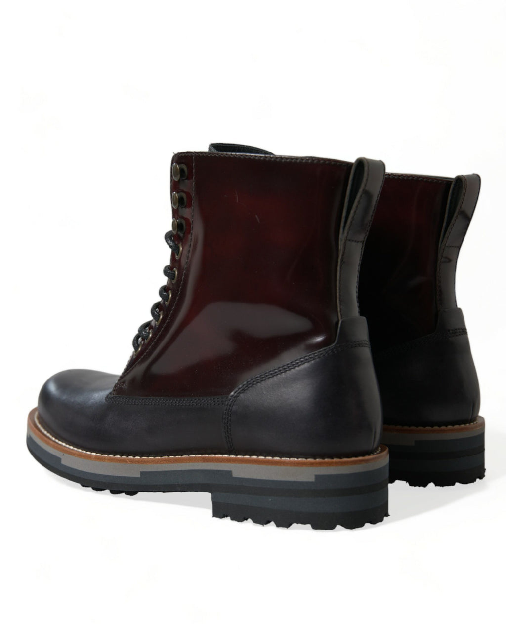 Chaussures bottines militaires en cuir noir de Dolce & Gabbana, style combat, avec lacets et semelle robuste.