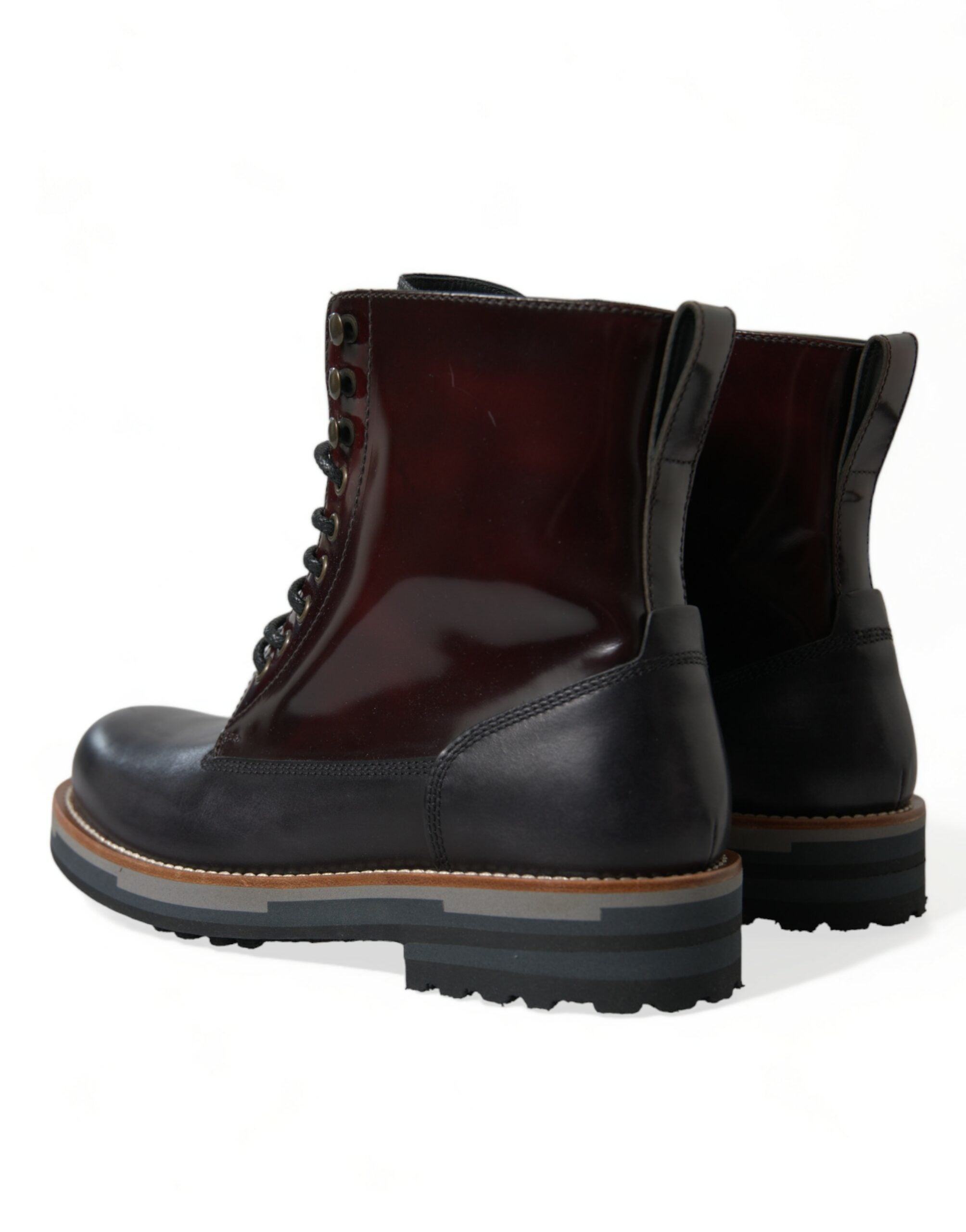 Chaussures bottines militaires en cuir noir de Dolce & Gabbana, style combat, avec lacets et semelle robuste.