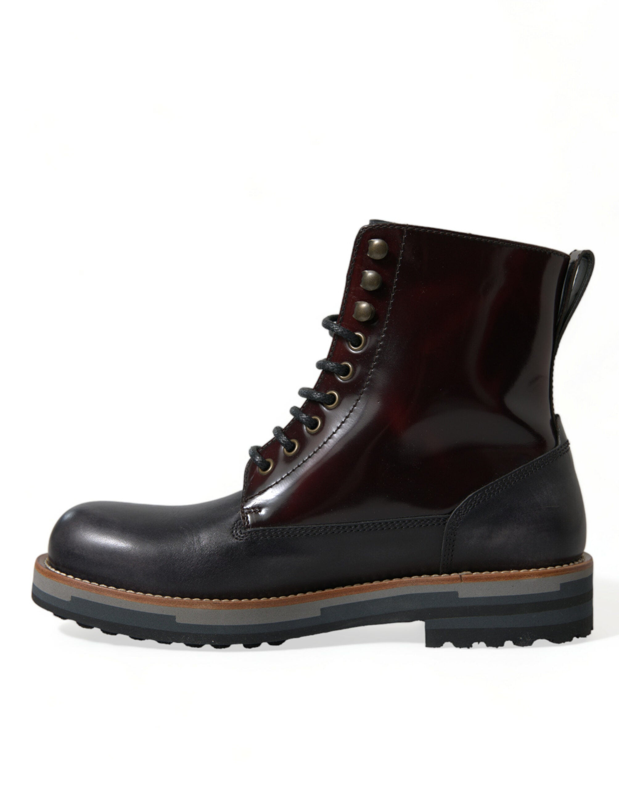 Bottes de combat militaires en cuir noir de Dolce & Gabbana, chaussures élégantes et robustes, avec détails en cuir et semelle solide.