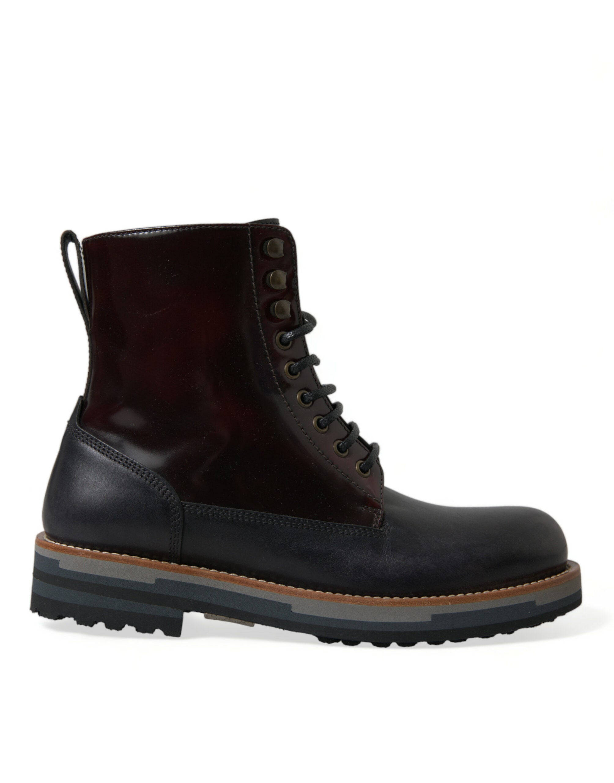 Bottes de combat en cuir noir Dolce & Gabbana, style militaire, chaussures robustes et élégantes pour hommes.