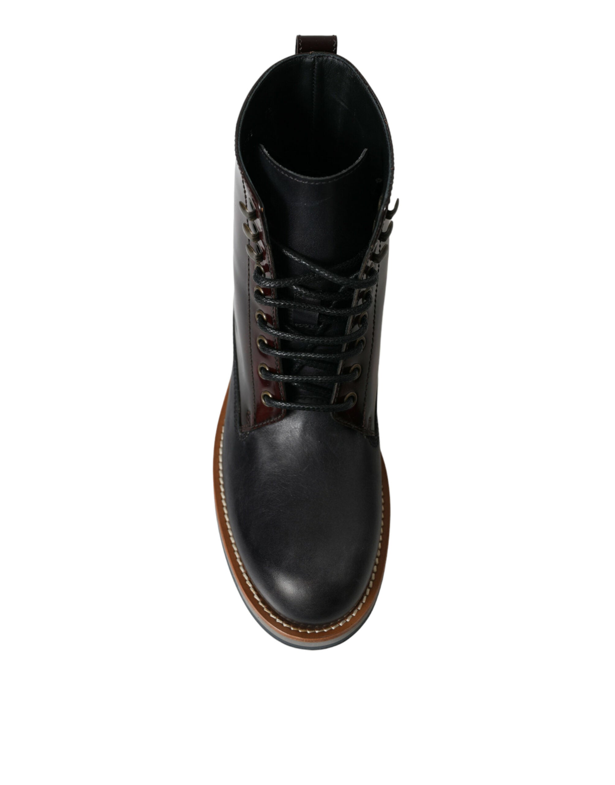 Chaussures bottines militaires en cuir noir de Dolce & Gabbana, style robuste et élégant, vue de face.