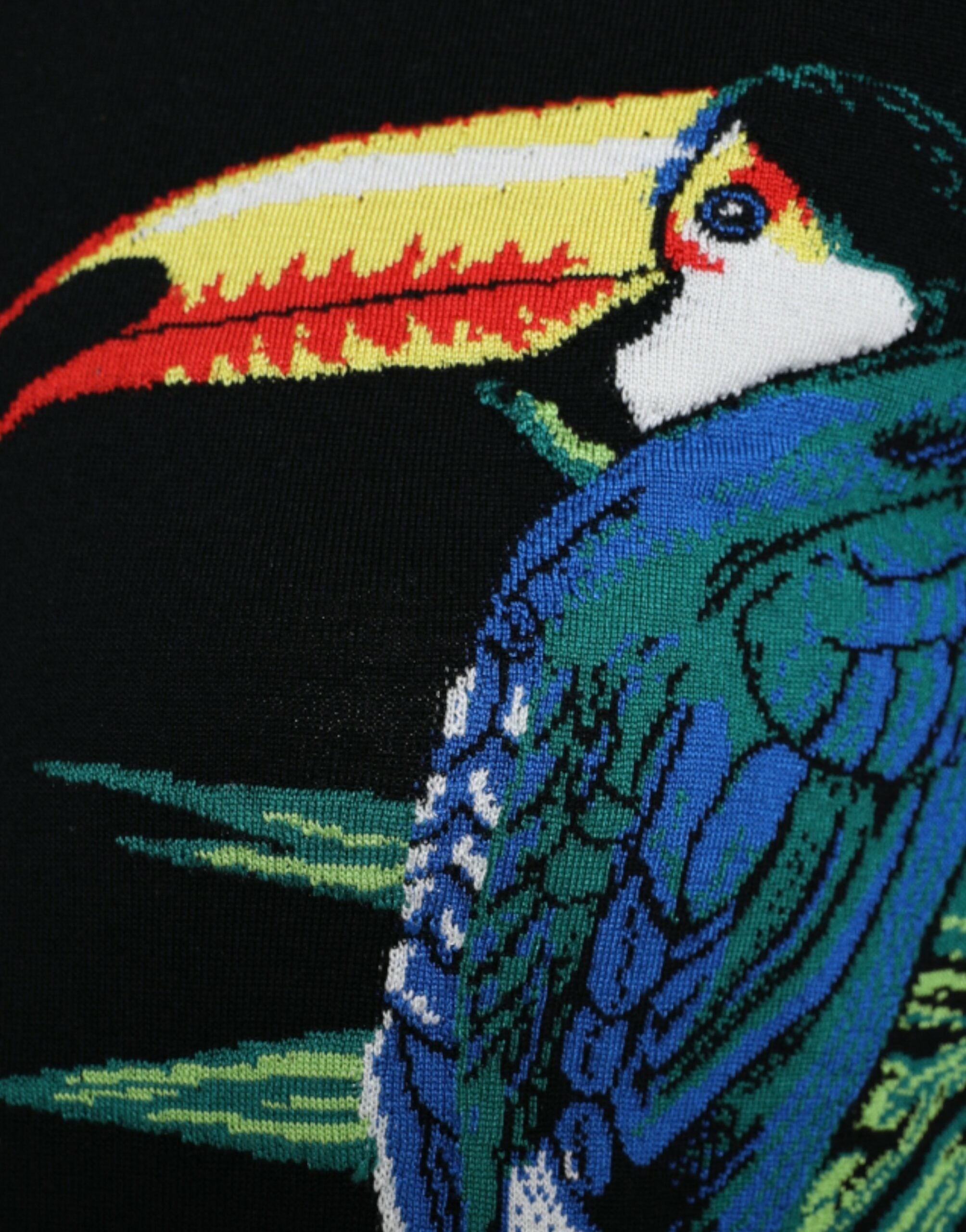 Pull-over cardigan en laine noir avec motif oiseau de Dolce & Gabbana, manches longues et coupe élégante.