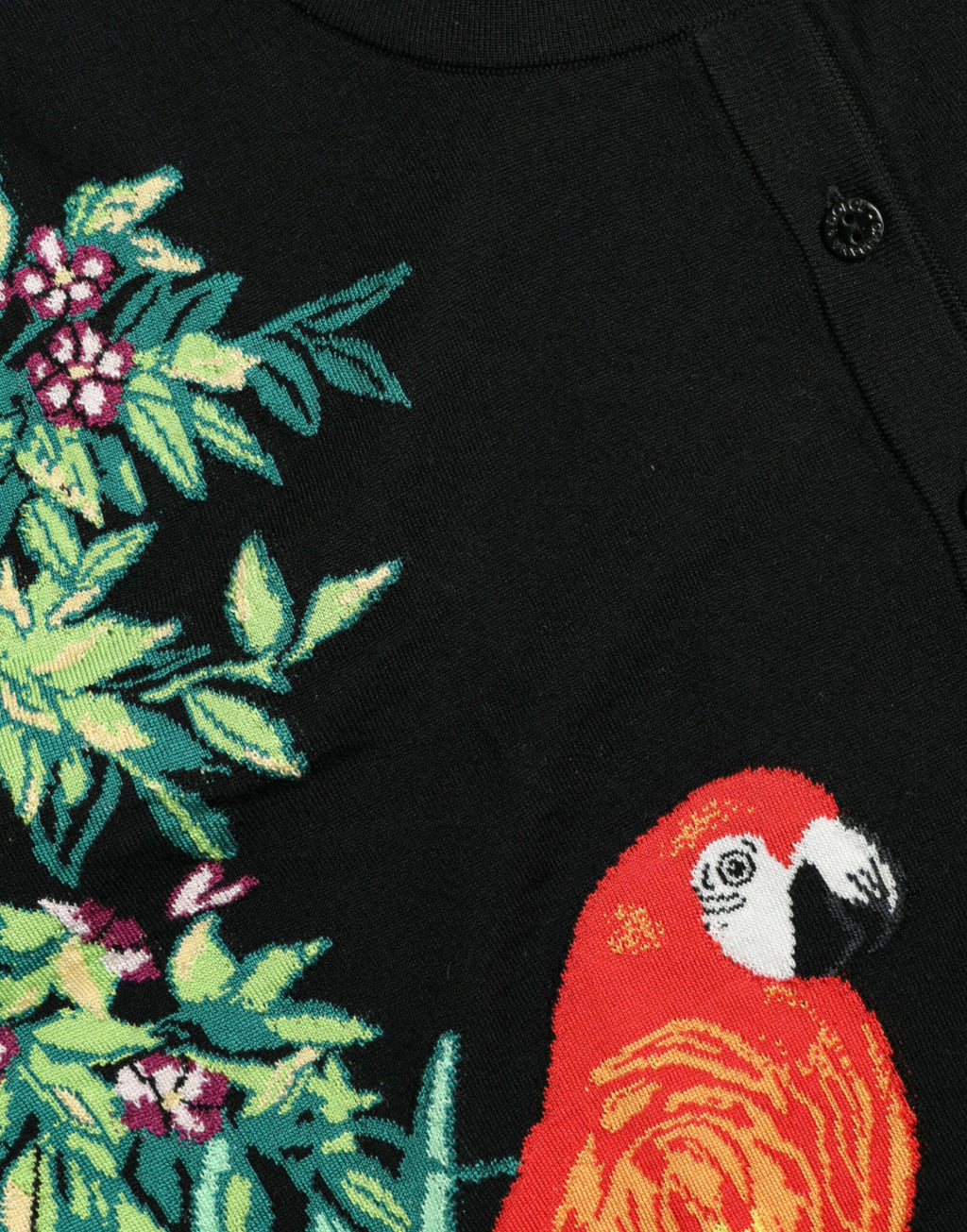 Pull en laine noir Dolce & Gabbana Bird avec manches longues, détails élégants et texture douce visible sur le cardigan.