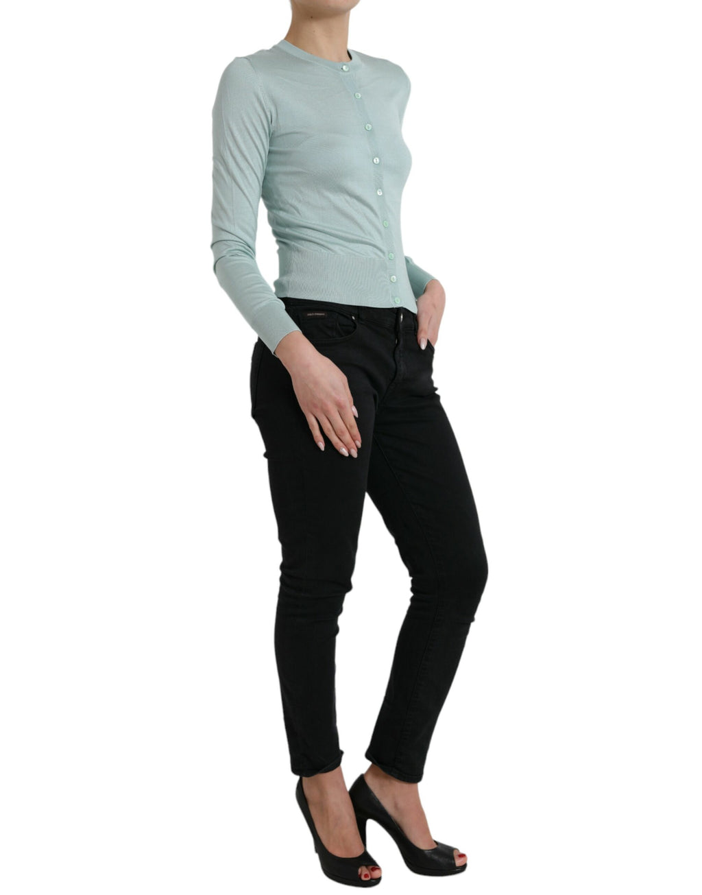 Cardigan en soie Dolce & Gabbana Light Blue avec col rond, douceur et élégance visibles dans l'image.
