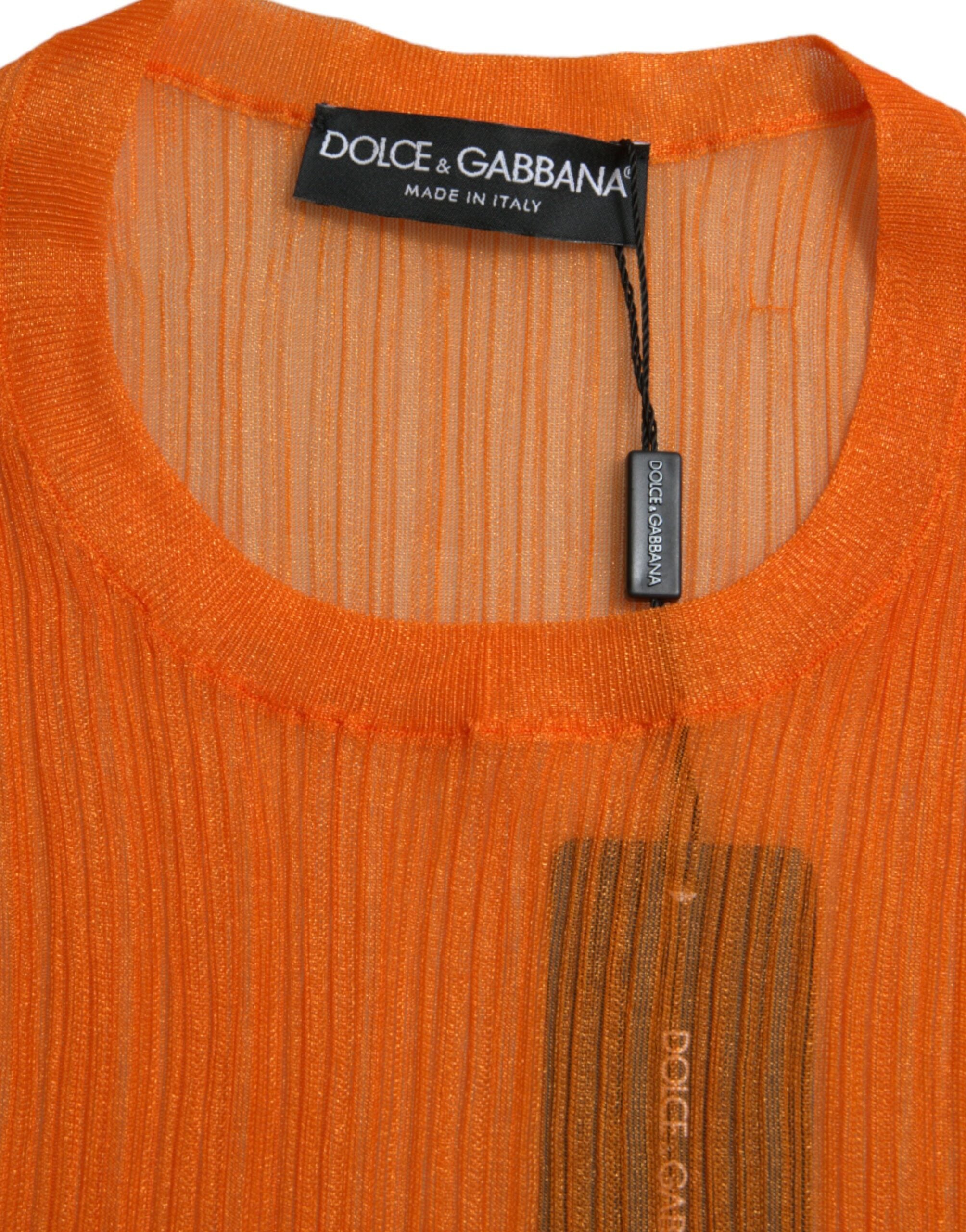 Haut blanc en dentelle transparente Dolce & Gabbana, débardeur à col rond, style élégant et léger.