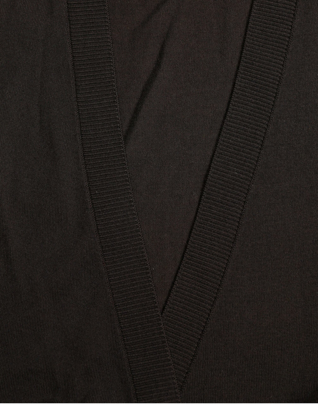 Pull cardigan Dolce & Gabbana en laine noire avec col en V croisé, porté sur un mannequin.