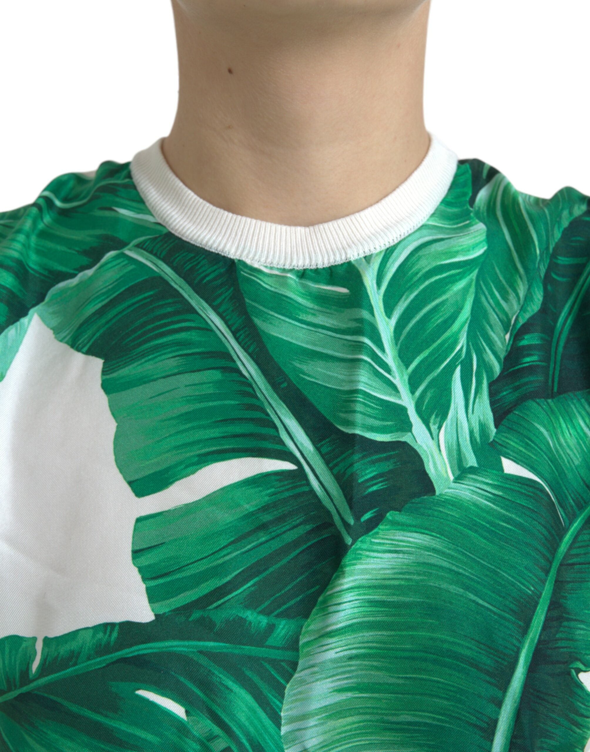 T-shirt sans manches blanc Dolce & Gabbana avec motif feuille de bananier en coton léger, col rond, style estival et tendance.