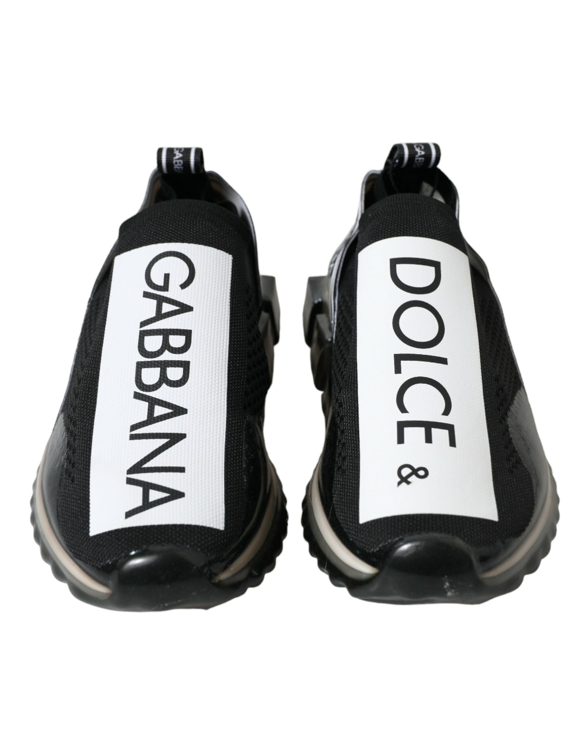Chaussures Dolce & Gabbana Sorrento Slip-On noires et blanches en toile, faciles à enfiler, pour un style élégant et décontracté.