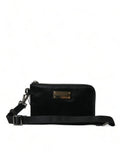 Pochette Dolce & Gabbana en nylon noir avec logo, porte-clés et design élégant, vue de face.