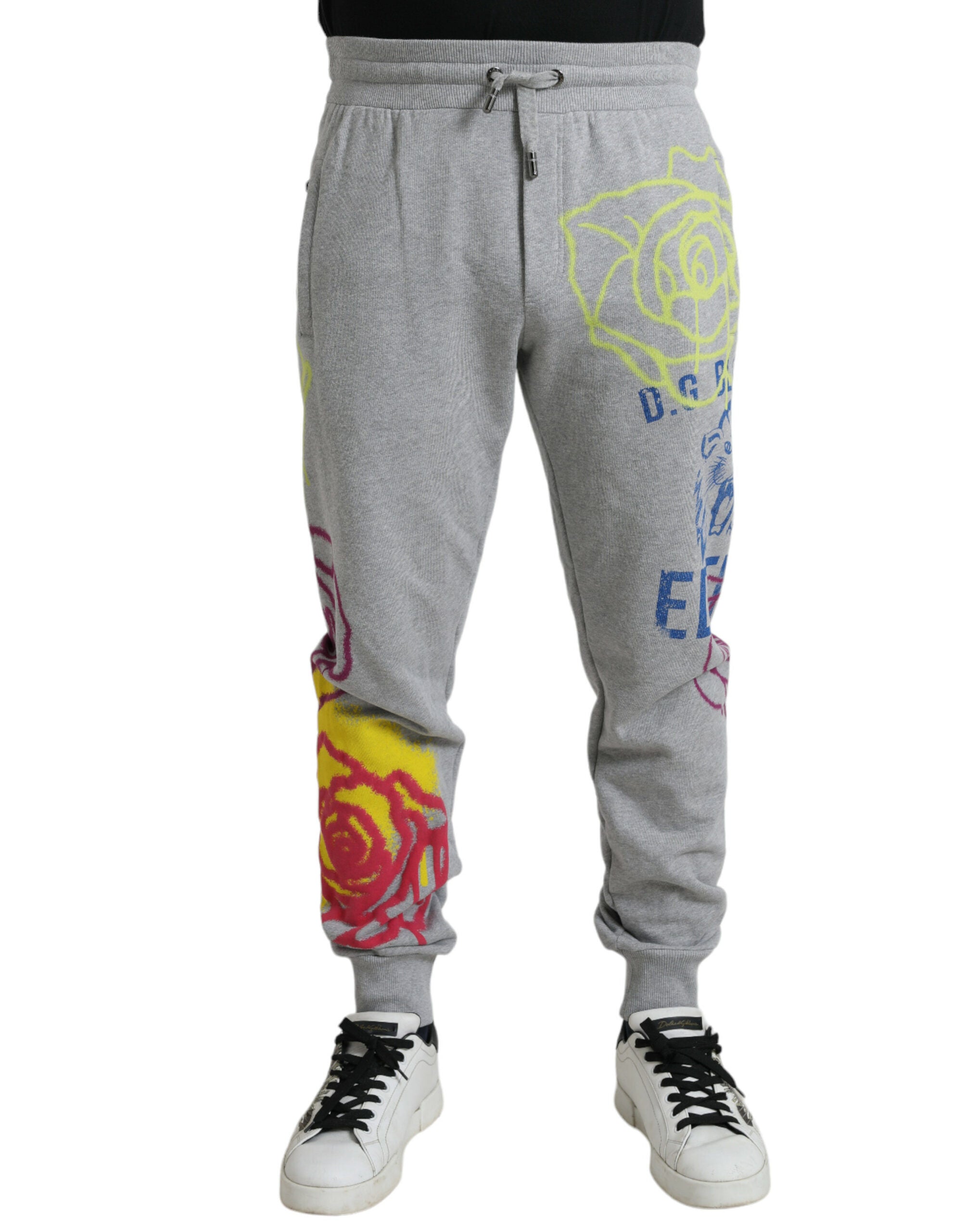 Pantalons jogger Dolce & Gabbana en coton gris avec motif graffiti, style décontracté et tendance pour homme.