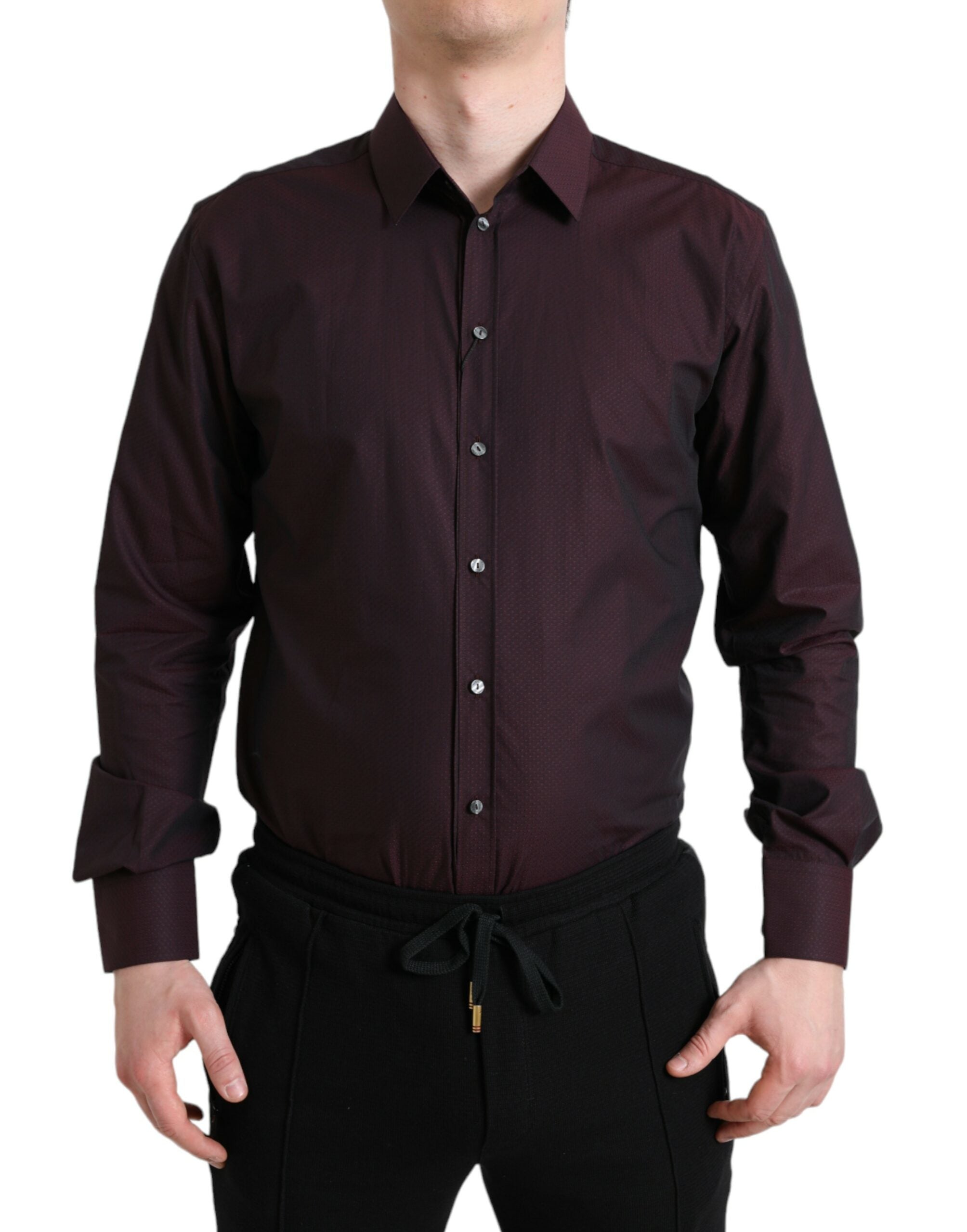 Robe de soirée en jacquard bordeaux Dolce & Gabbana avec manches longues et détails élégants, idéale pour occasions formelles.