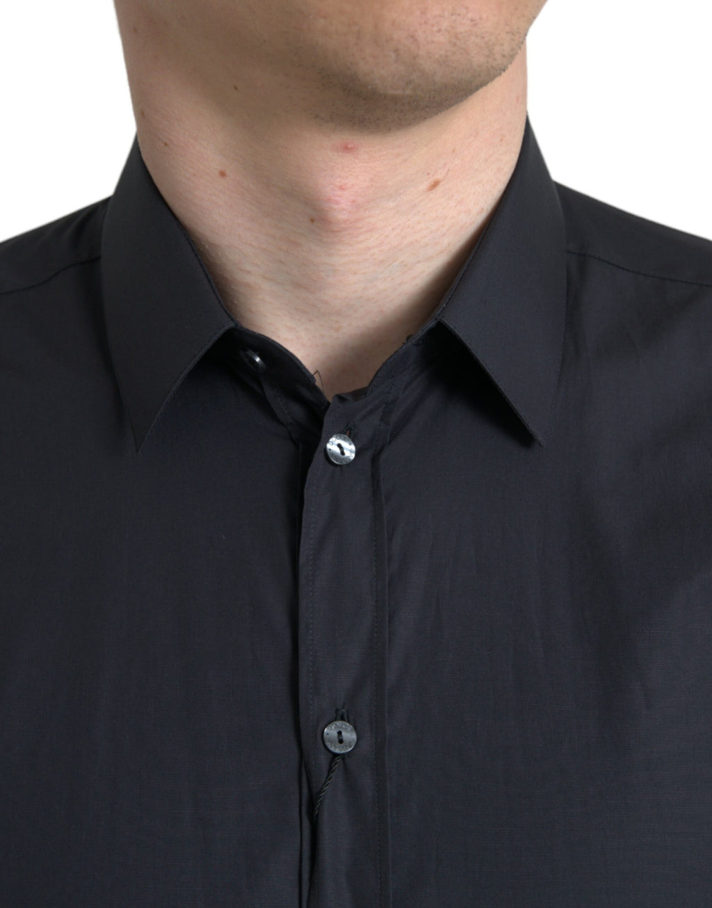 Chemise formelle en coton bleu marine de Dolce & Gabbana avec col, vue de devant.