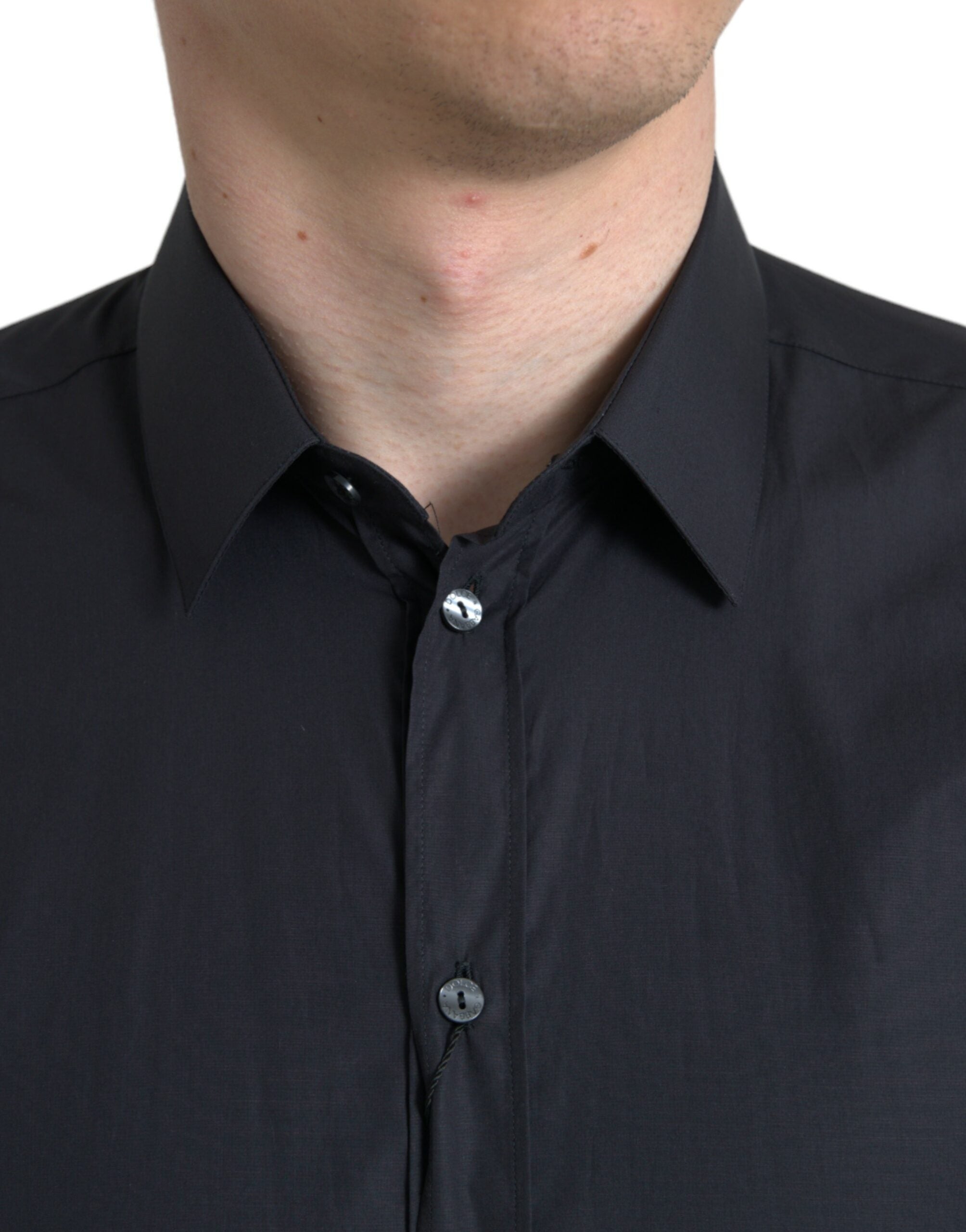 Chemise formelle en coton bleu marine de Dolce & Gabbana avec col, vue de devant.