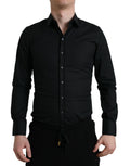 Chemise formelle noire en coton stretch de Dolce & Gabbana, slim et élégante, visible en gros plan sur l'image.