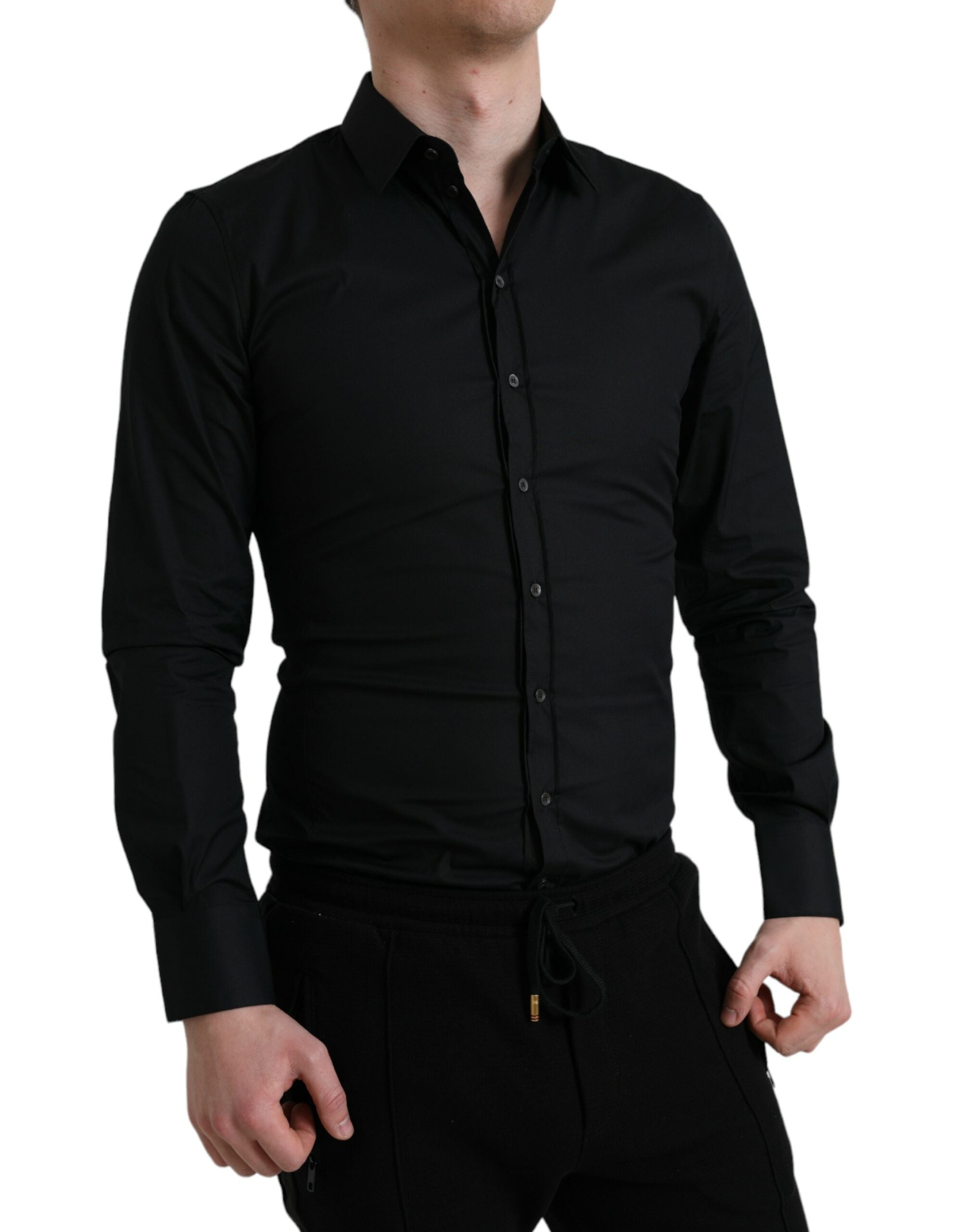 Chemise formelle noire en coton stretch de Dolce & Gabbana, coupe slim et élégante, visible avec col et boutons.