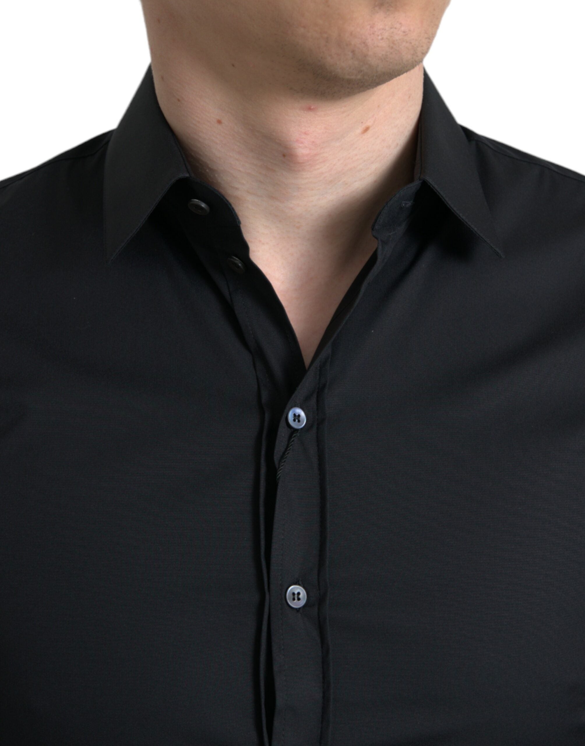 Chemise formelle Dolce & Gabbana en coton noir, ajustée, à coupe slim, avec col classique et boutons visibles.
