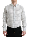 Chemise formelle blanche pour homme de Dolce & Gabbana avec motif doré, tissu élégant et col classique.